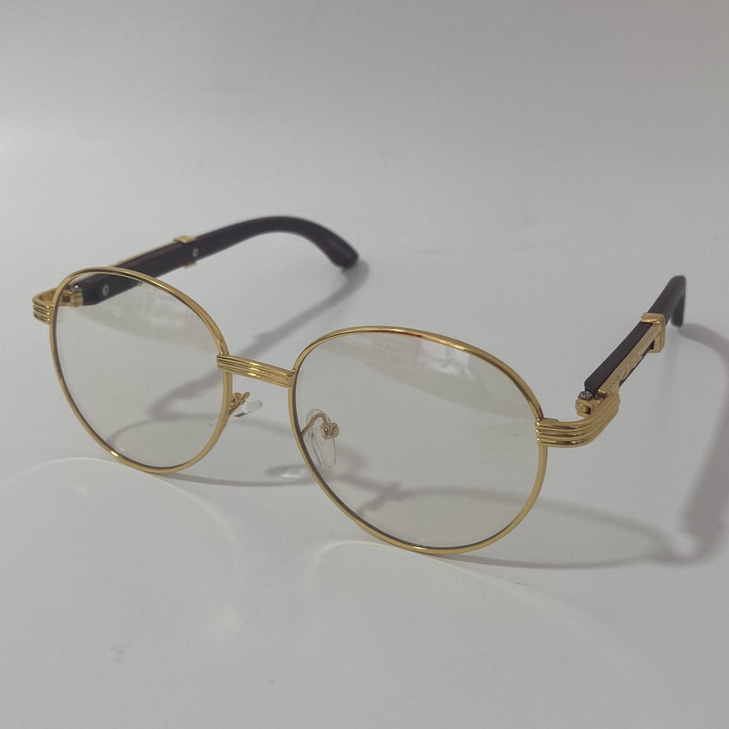 womens and mens gold round sunglasses