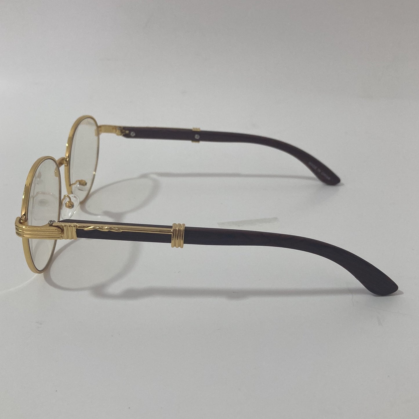 womens and mens gold round sunglasses