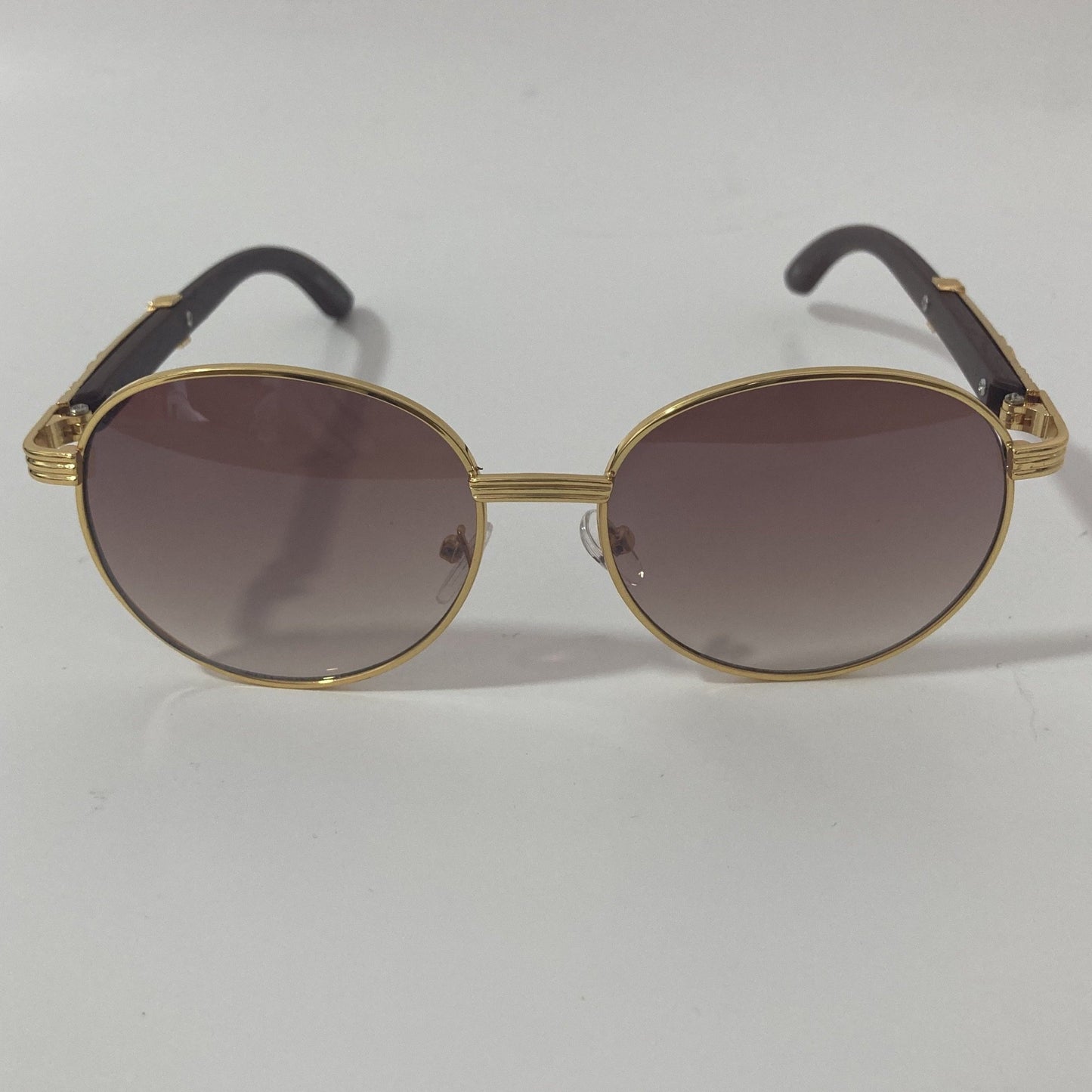 womens and mens gold and brown round sunglasses