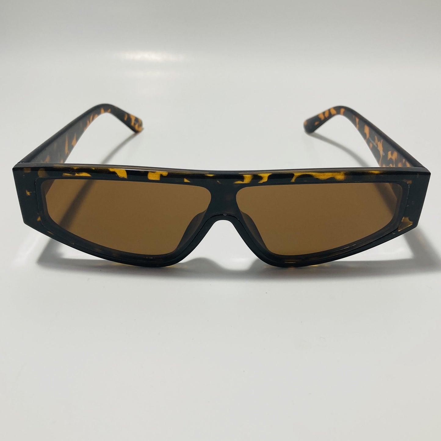 mens and womens brown futuristic sunglasses with brown lenses
