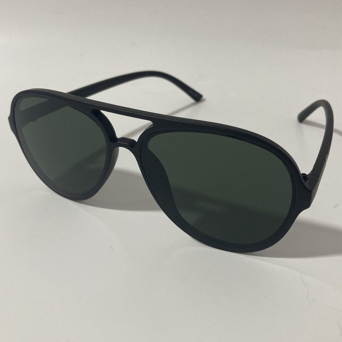 mens and womens black aviator sunglasses with green lenses