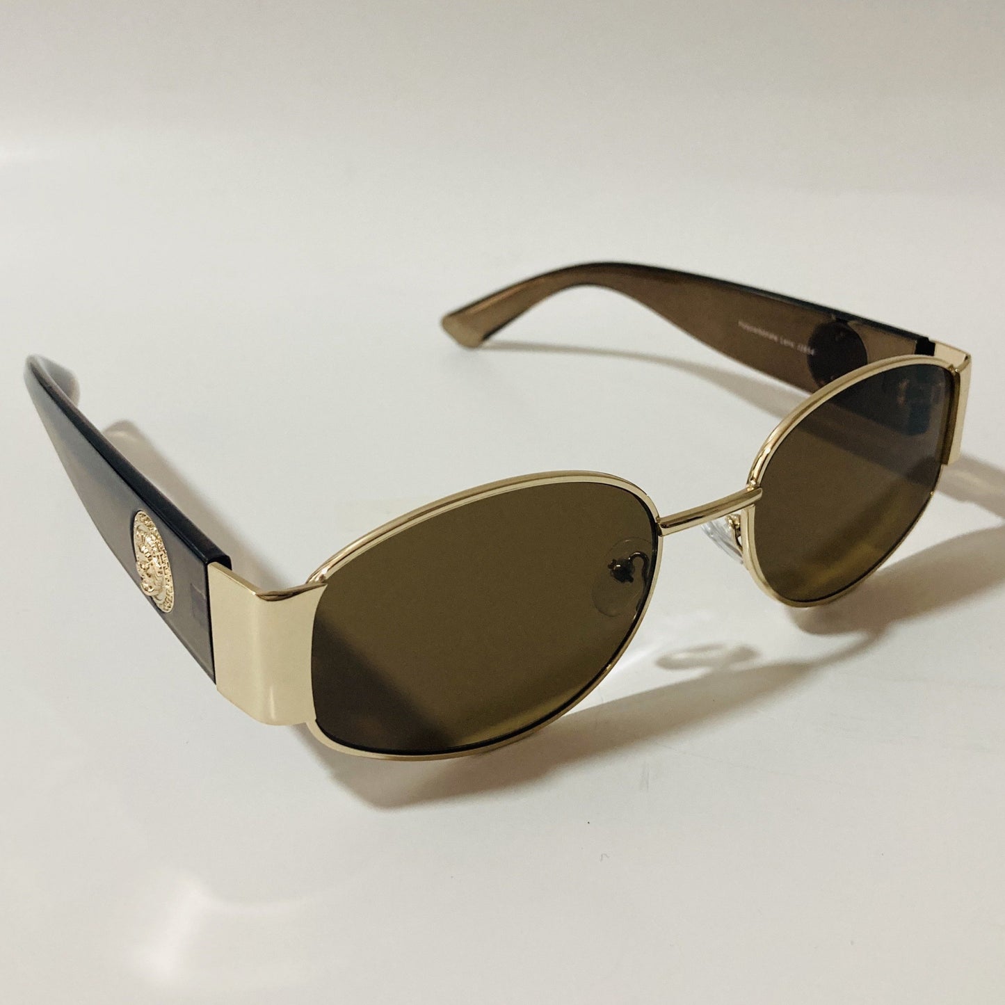 mens and womens brown and gold round sunglasses