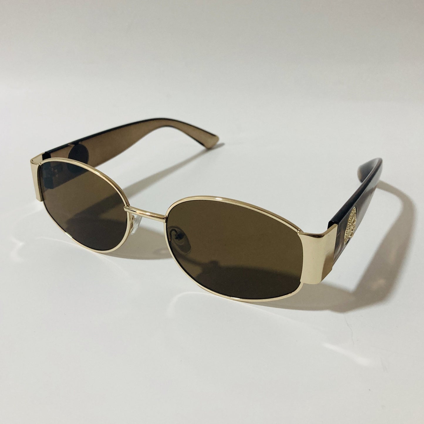 mens and womens brown and gold round sunglasses