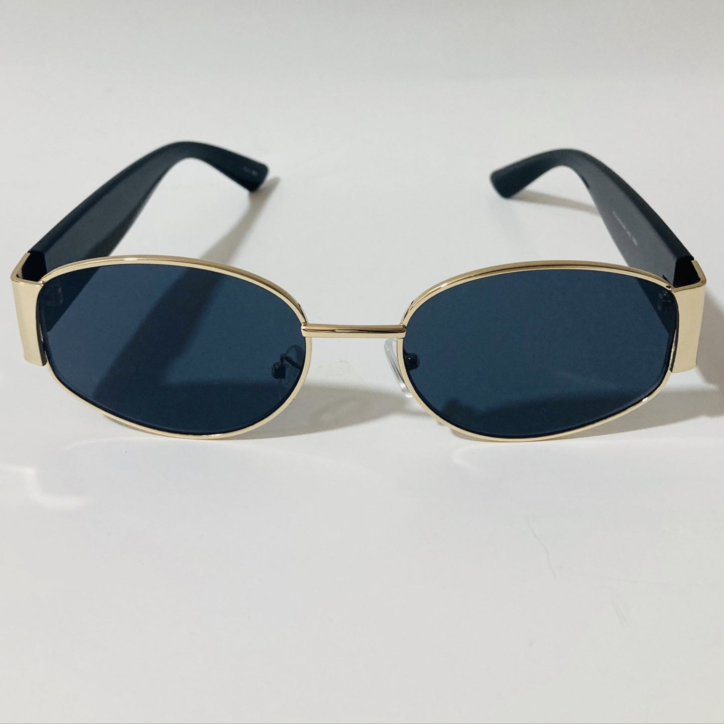 mens and womens black and gold round sunglasses
