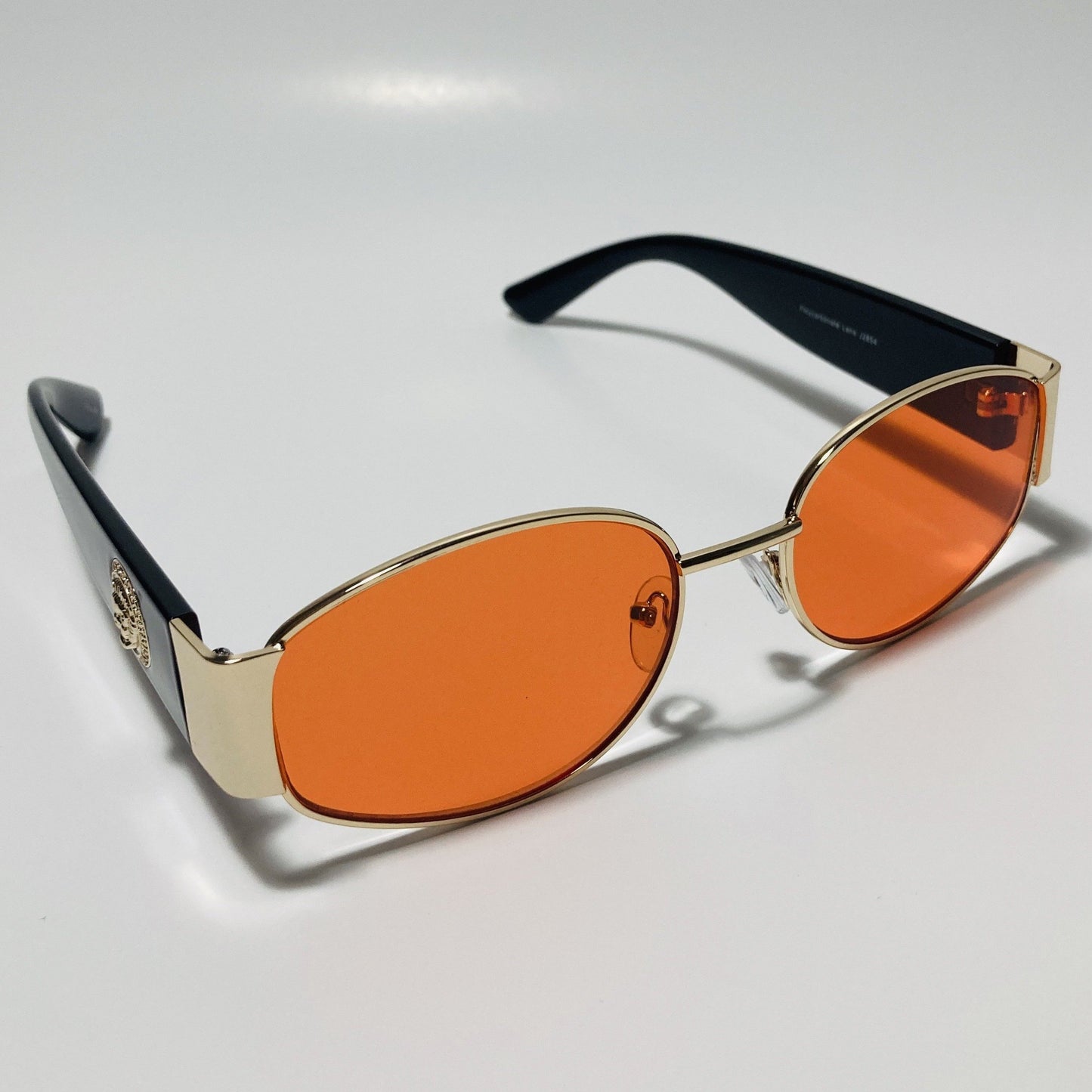mens and womens black red and gold round sunglasses