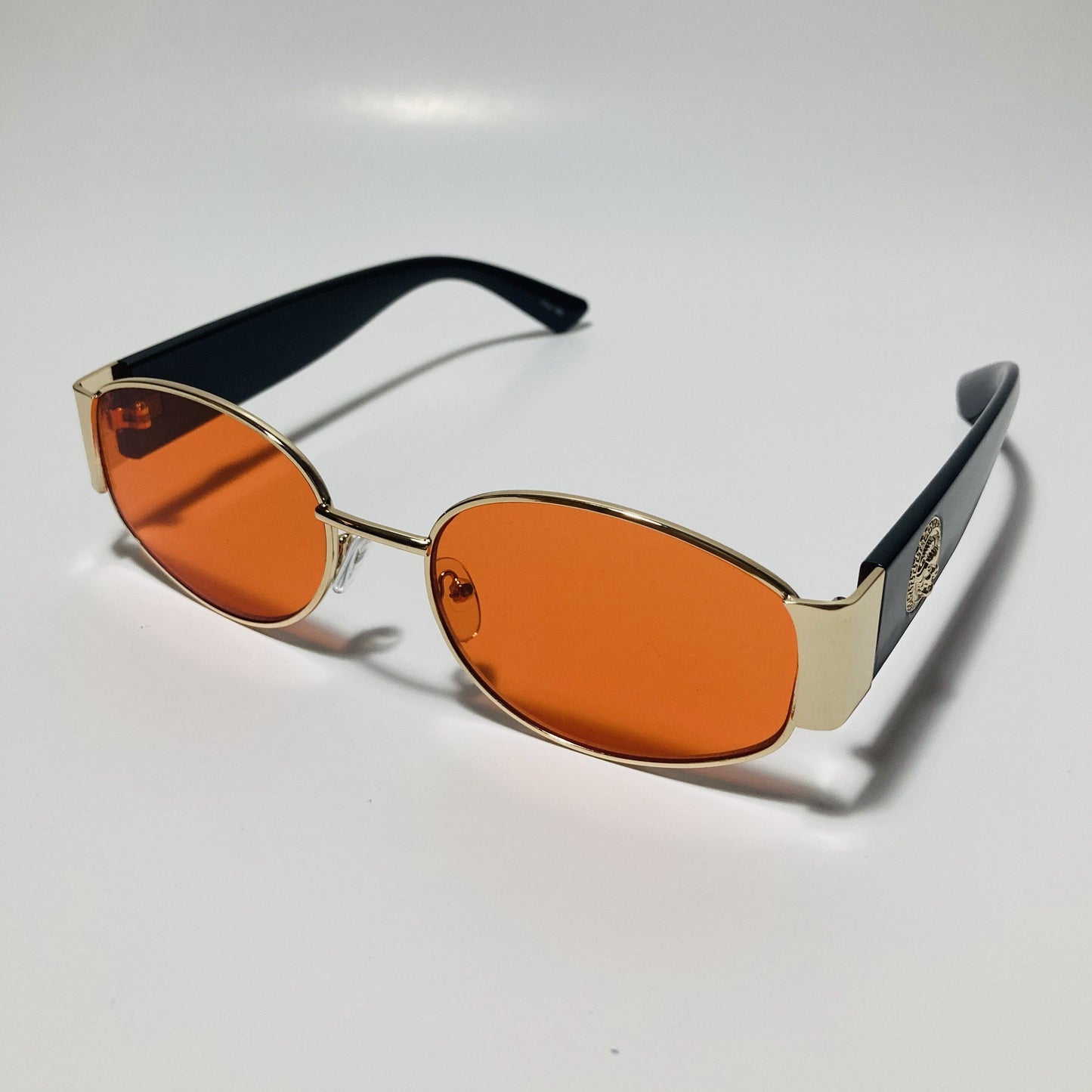 mens and womens black red and gold round sunglasses