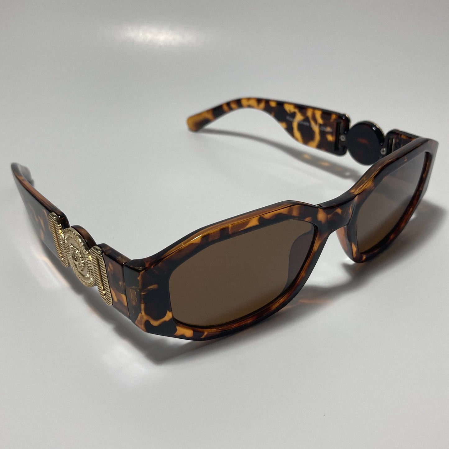 mens and womens brown and gold biggie sunglasses