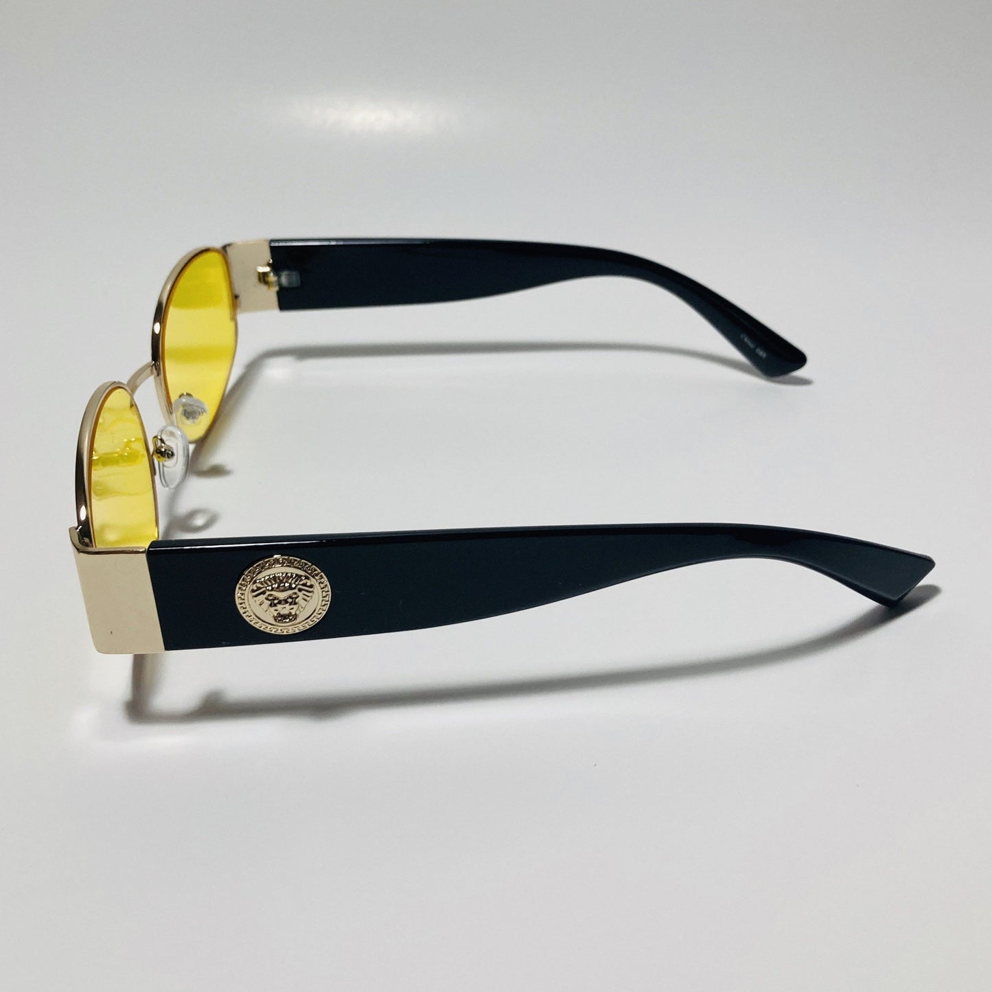 mens and womens black gold and yellow round sunglasses