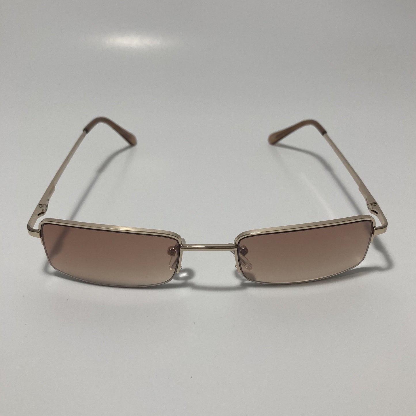 womens and mens brown and gold metal square sunglasses
