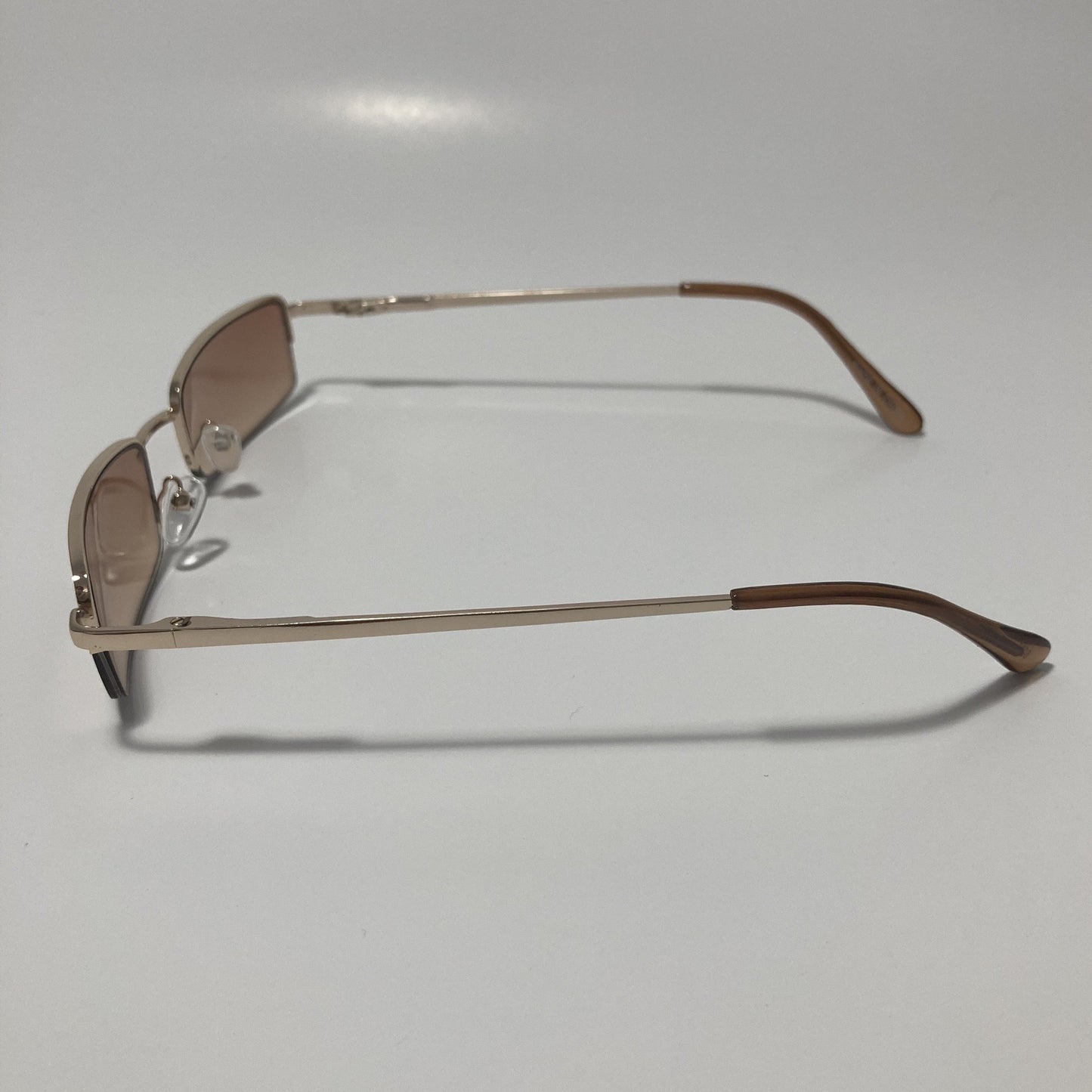 womens and mens brown and gold metal square sunglasses