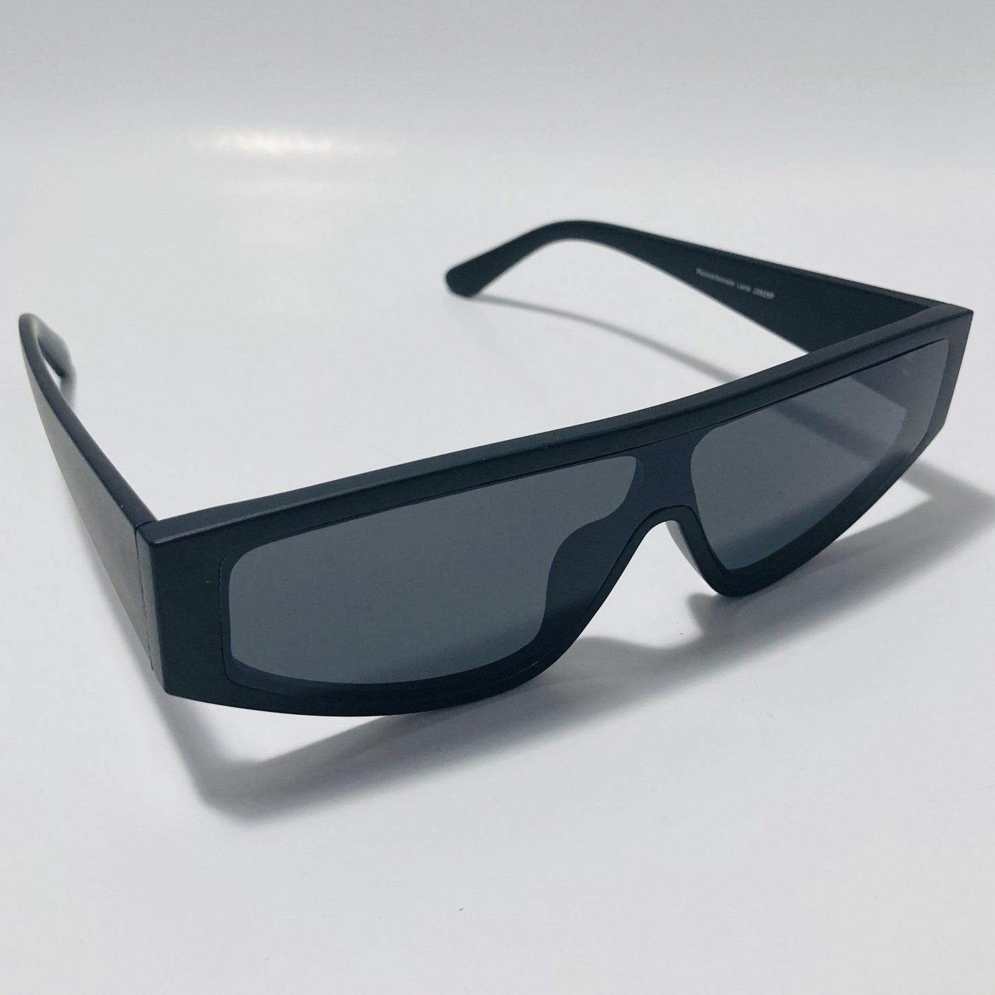 mens and womens black futuristic sunglasses with black lenses