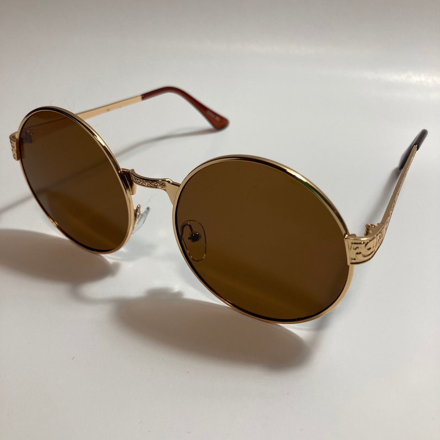 mens and womens gold round steampunk sunglasses with brown lenses
