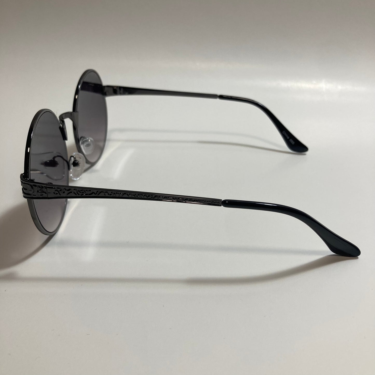 mens and womens black round steampunk sunglasses with black lenses