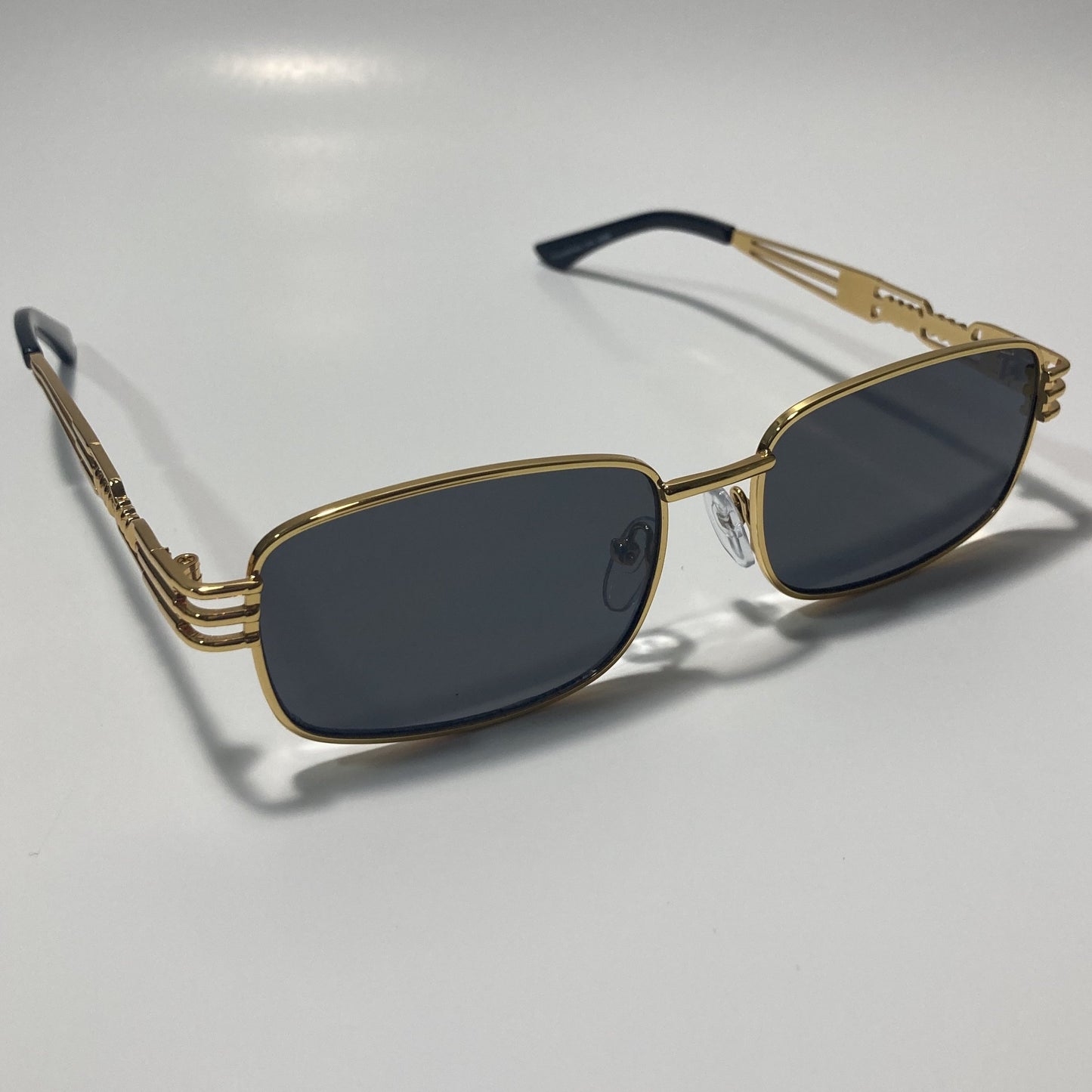 mens and womens gold square sunglasses with black lenses