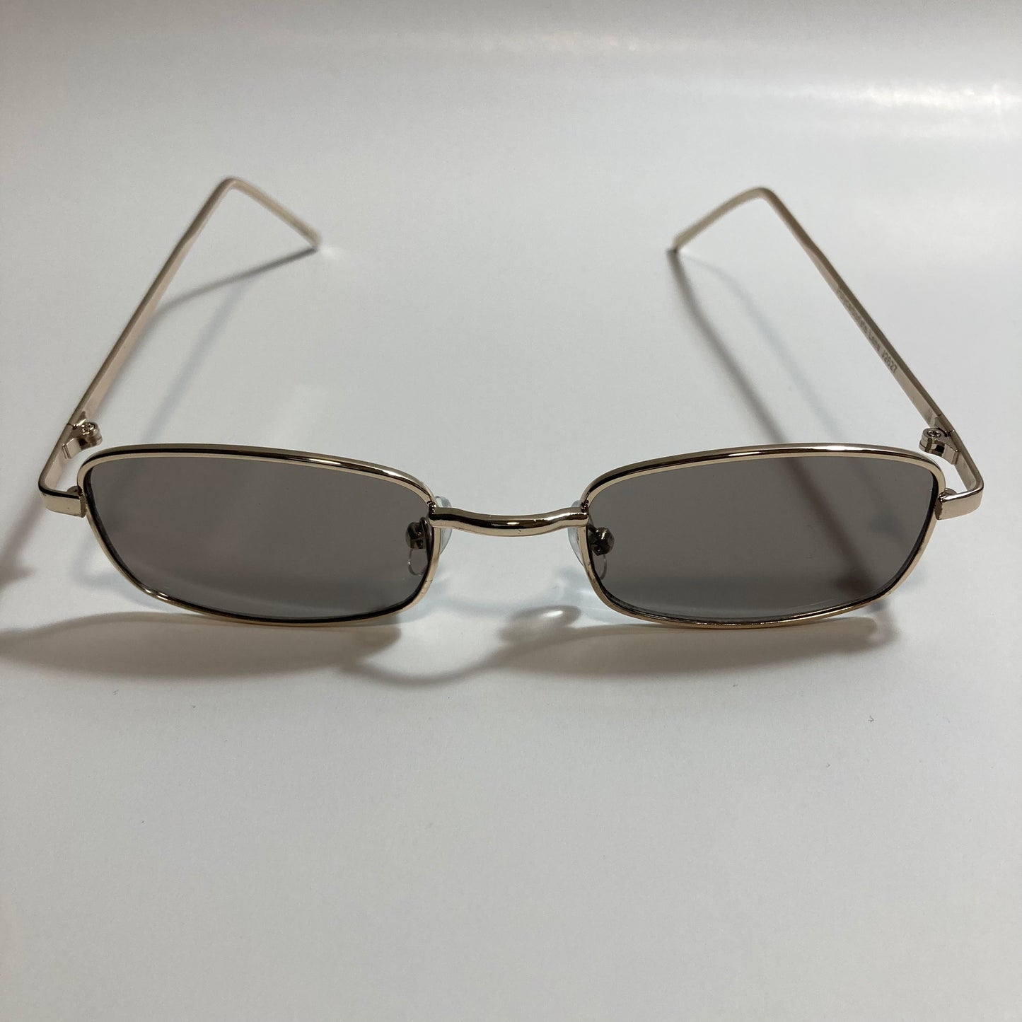mens and womens gold and black square sunglasses