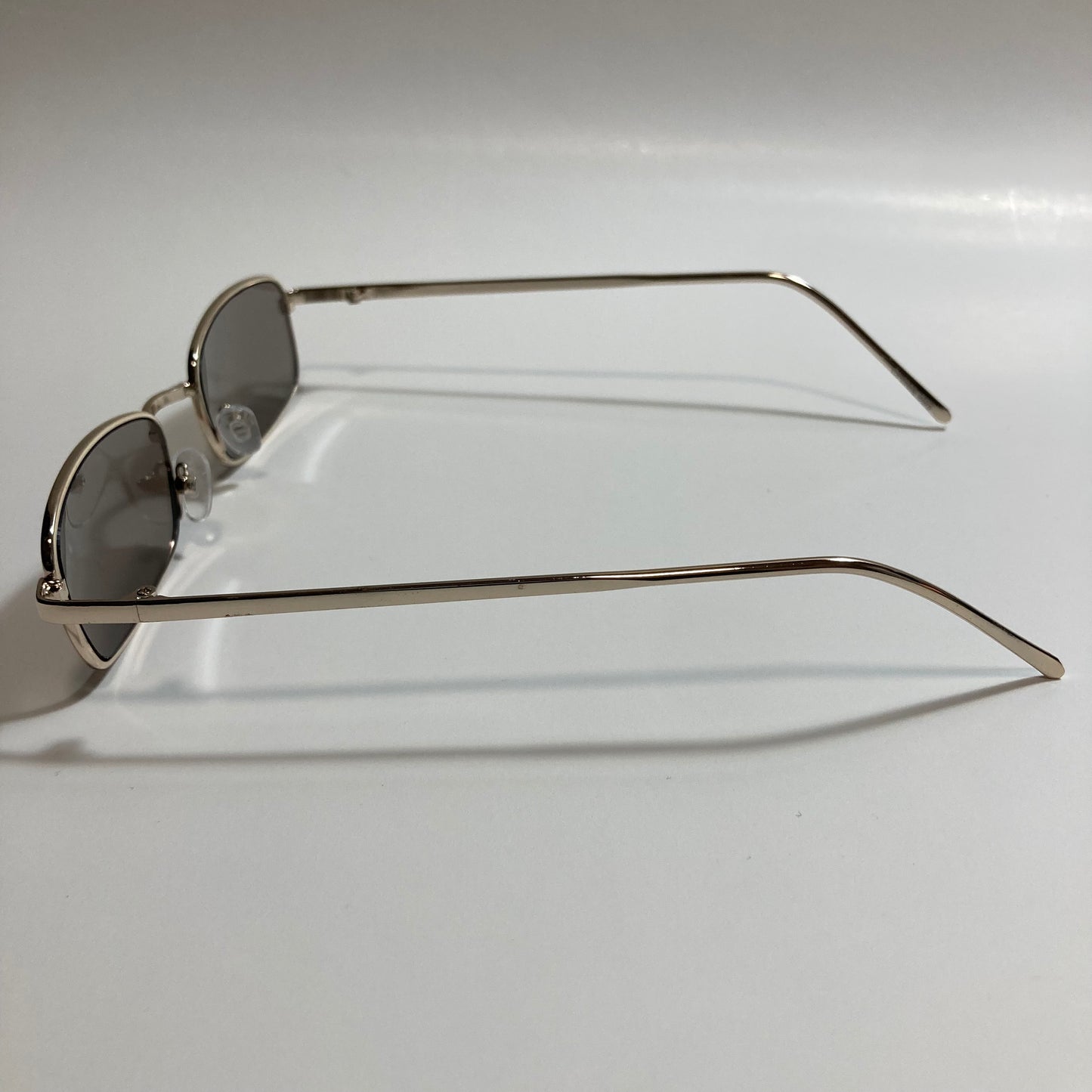 mens and womens gold and black square sunglasses