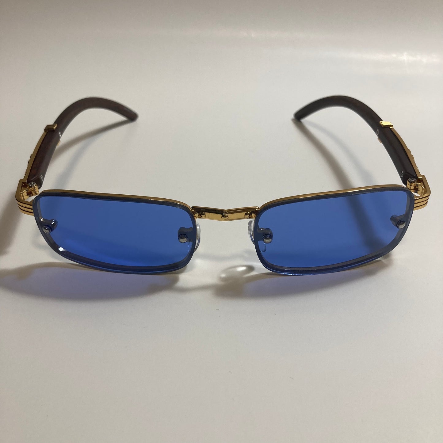 mens and womens blue and gold square sunglasses