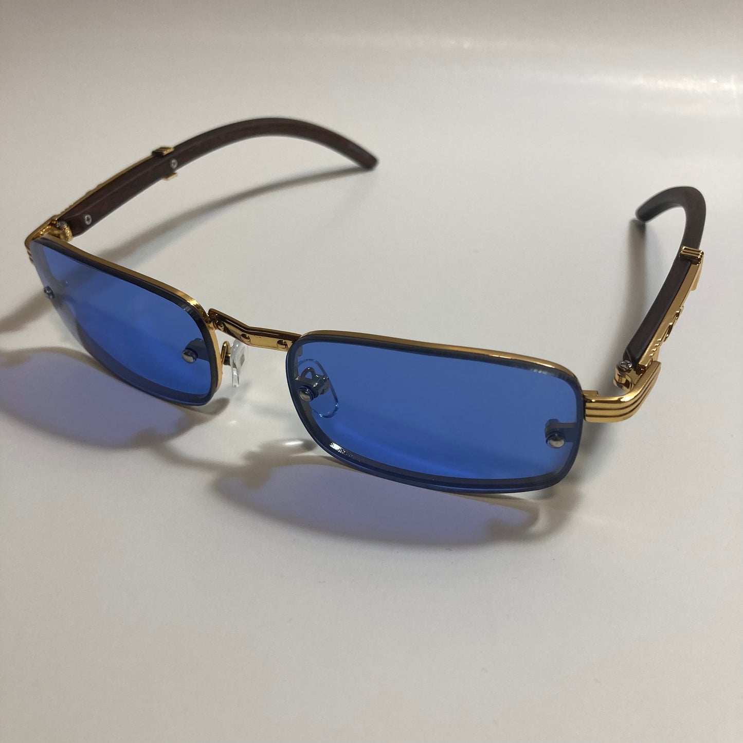mens and womens blue and gold square sunglasses