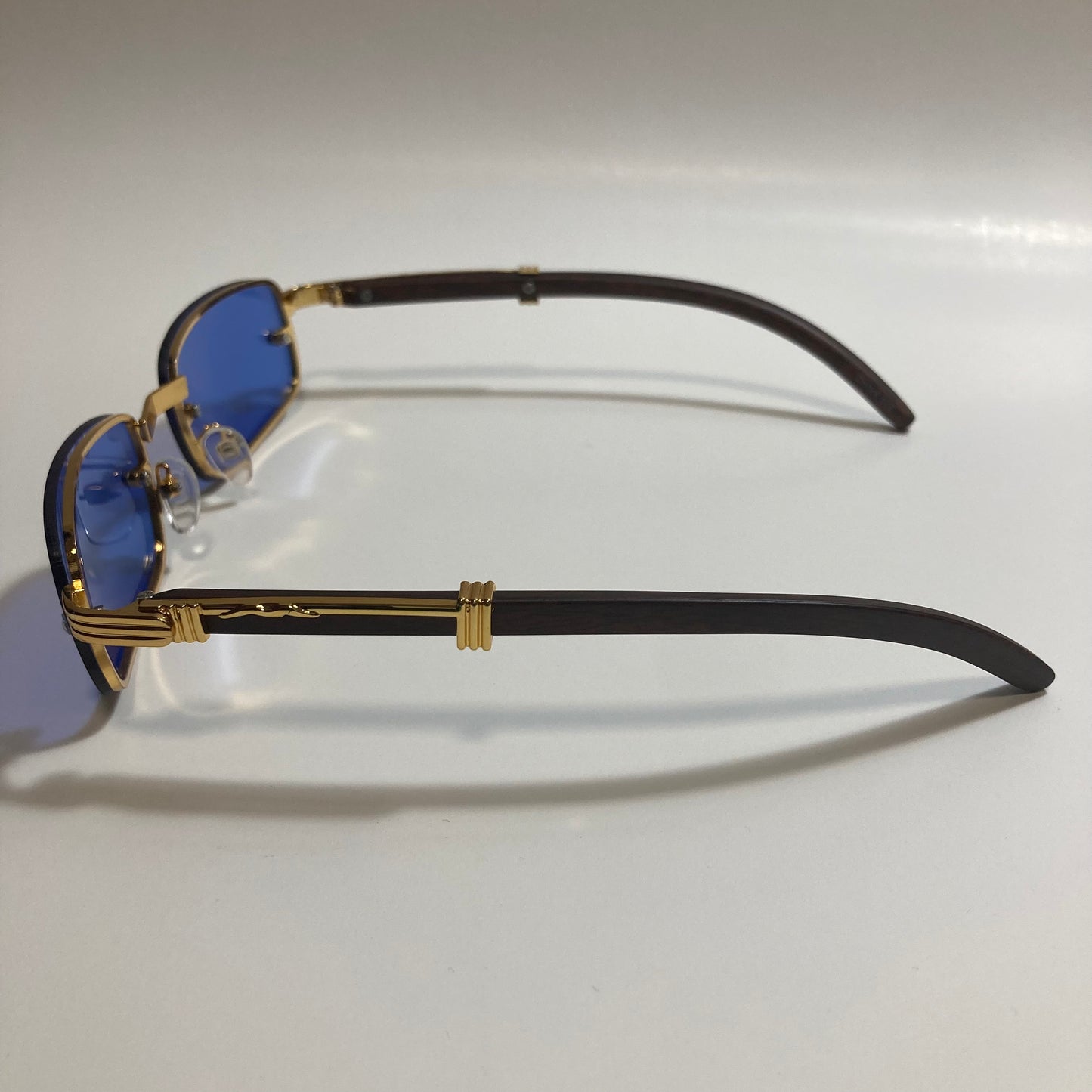 mens and womens blue and gold square sunglasses