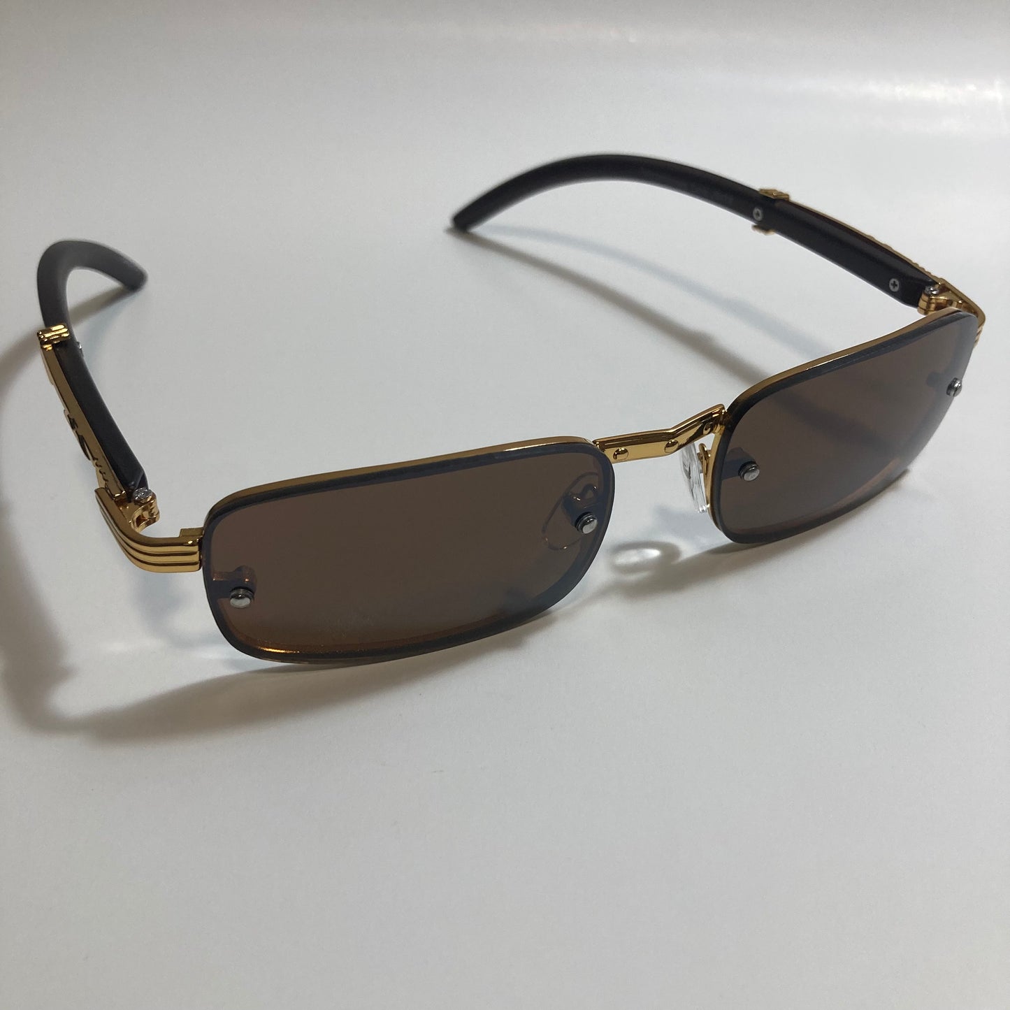 mens and womens brown and gold square sunglasses