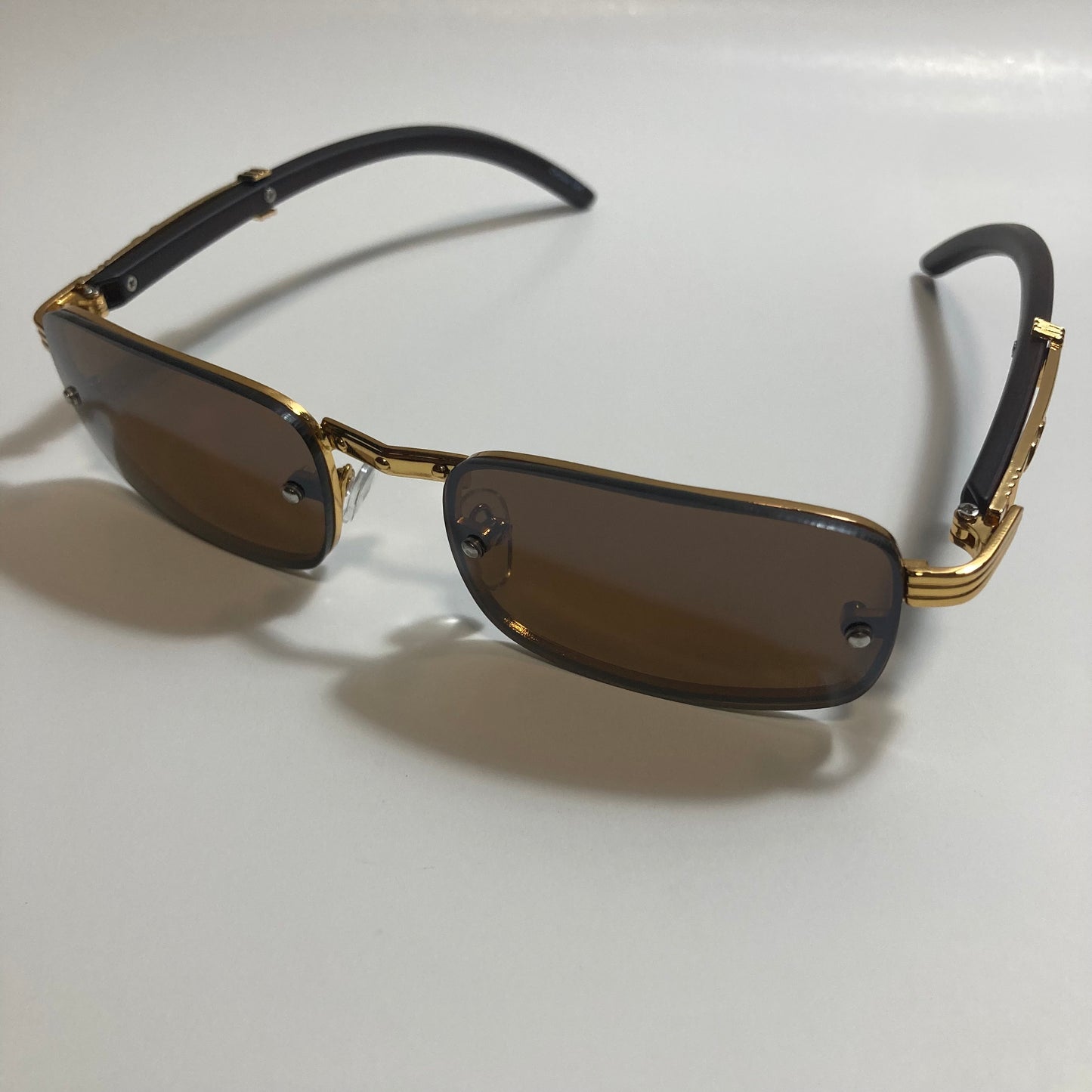 mens and womens brown and gold square sunglasses