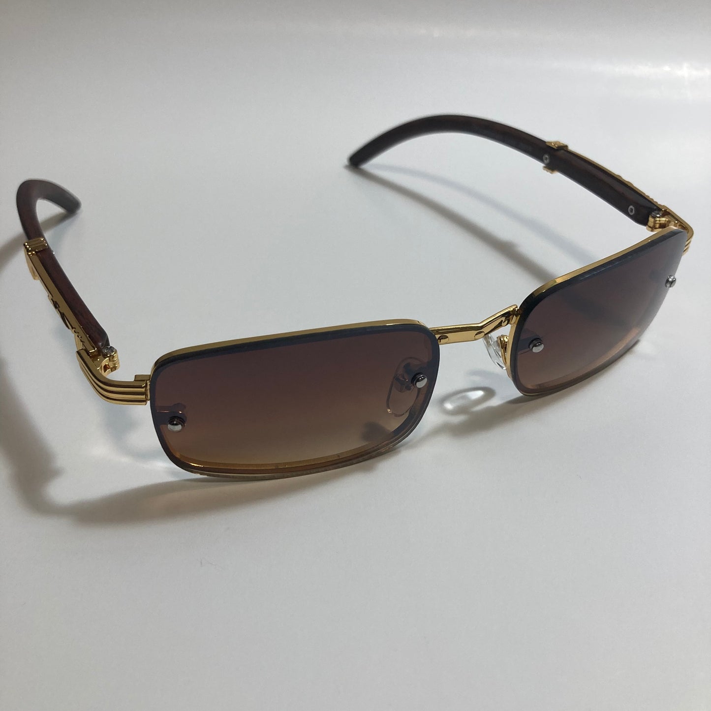 mens and womens brown and gold square sunglasses