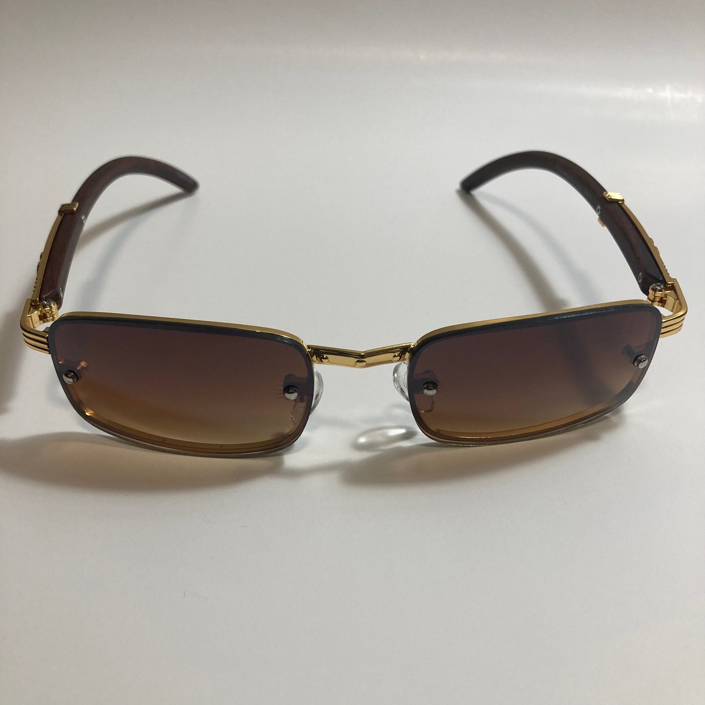 mens and womens brown and gold square sunglasses
