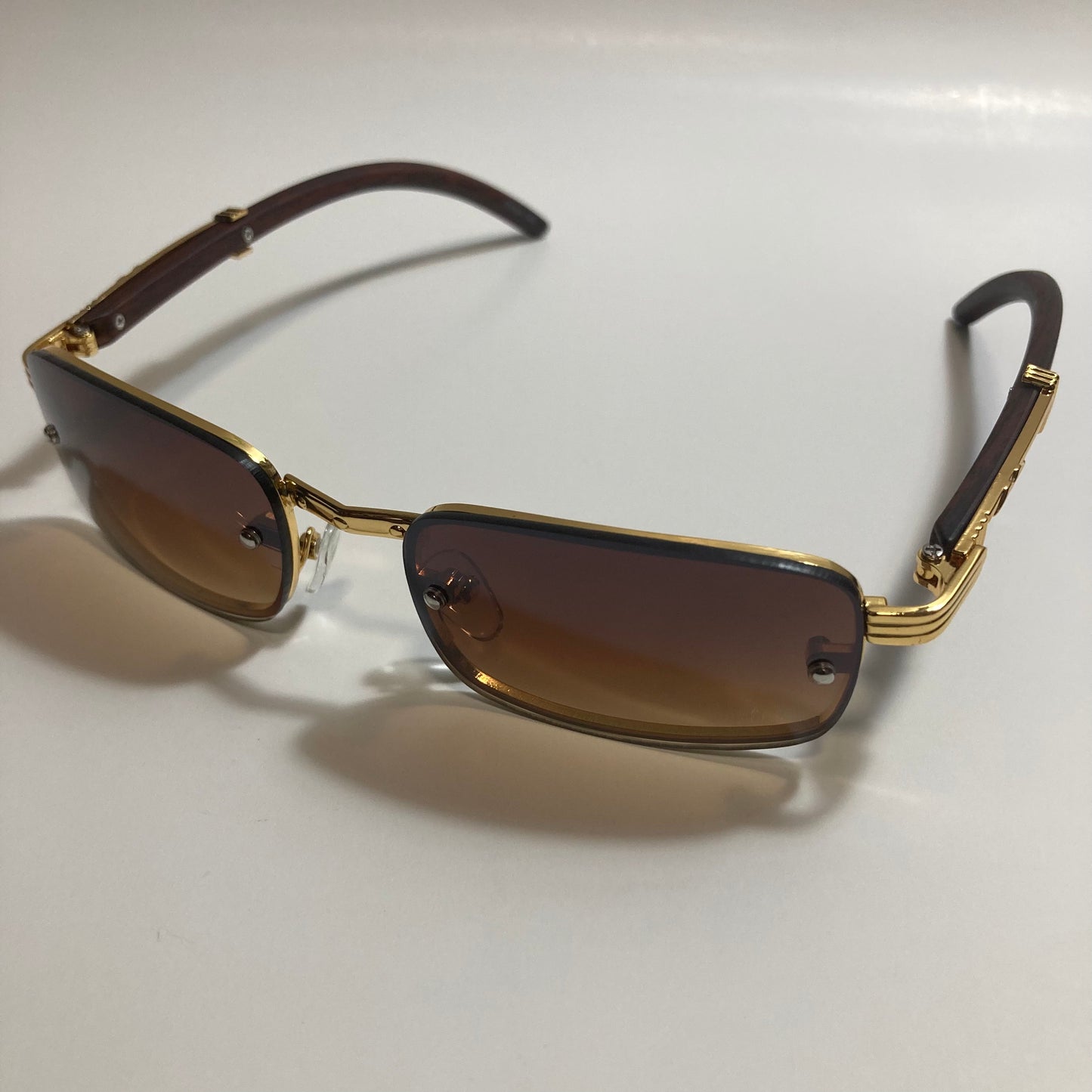 mens and womens brown and gold square sunglasses