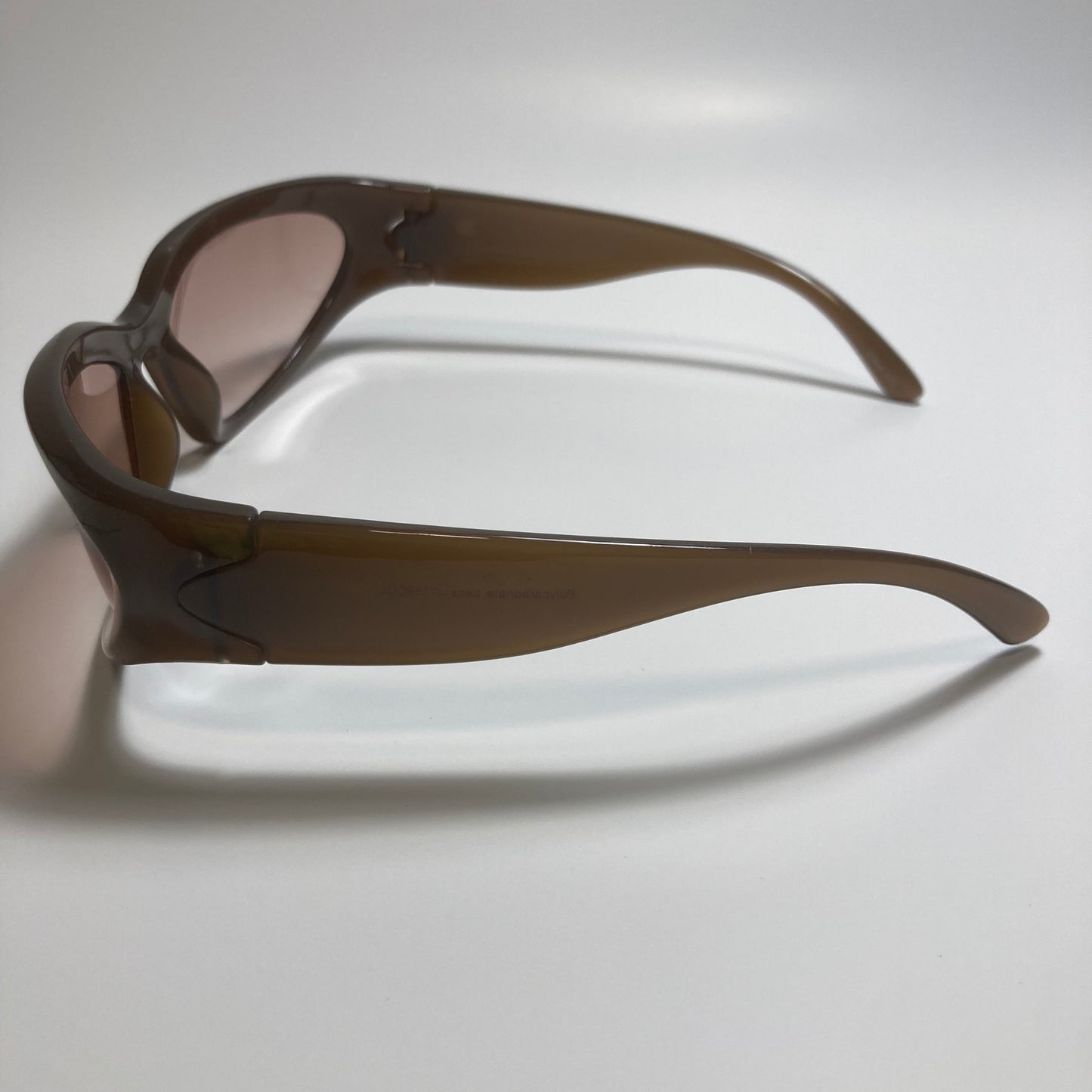 mens and womens brown wrap around sunglasses