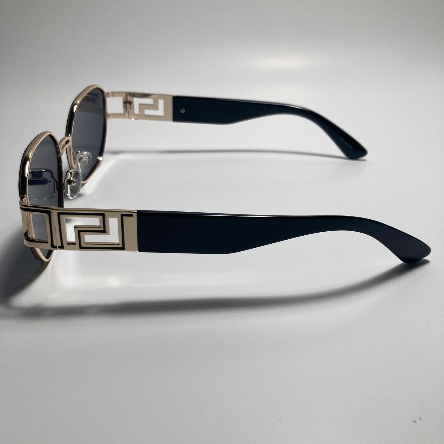mens and womens black and gold square sunglasses