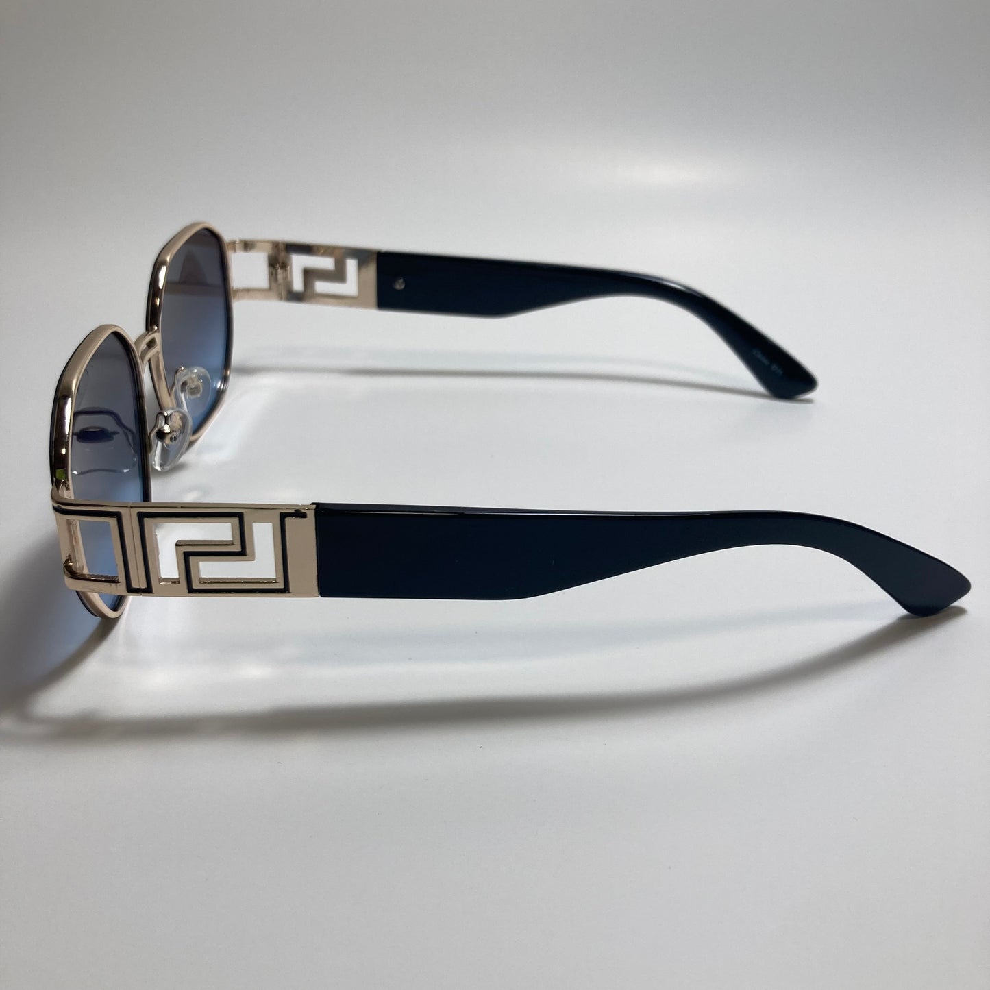 mens and womens black and gold square sunglasses