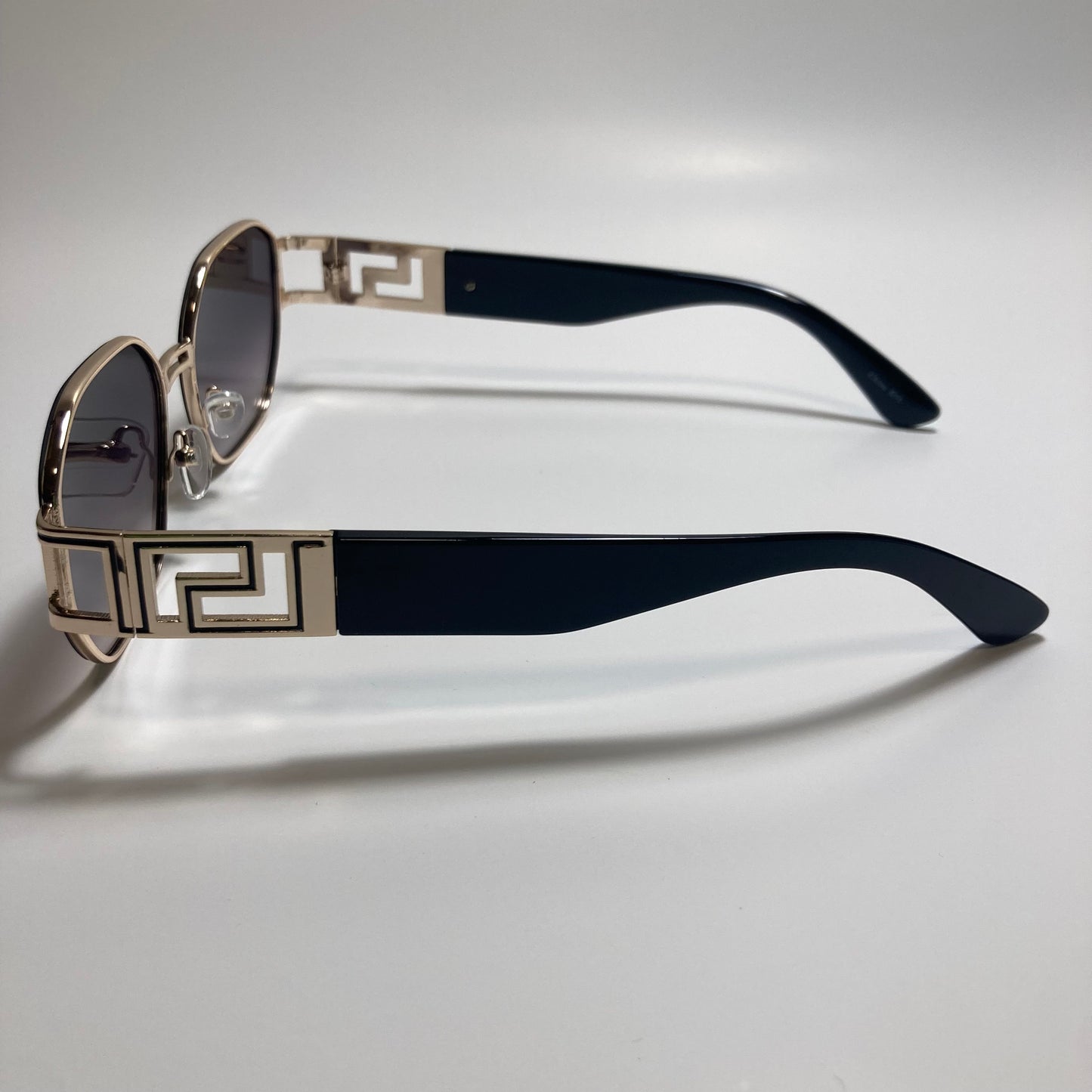 mens and womens black and gold square sunglasses