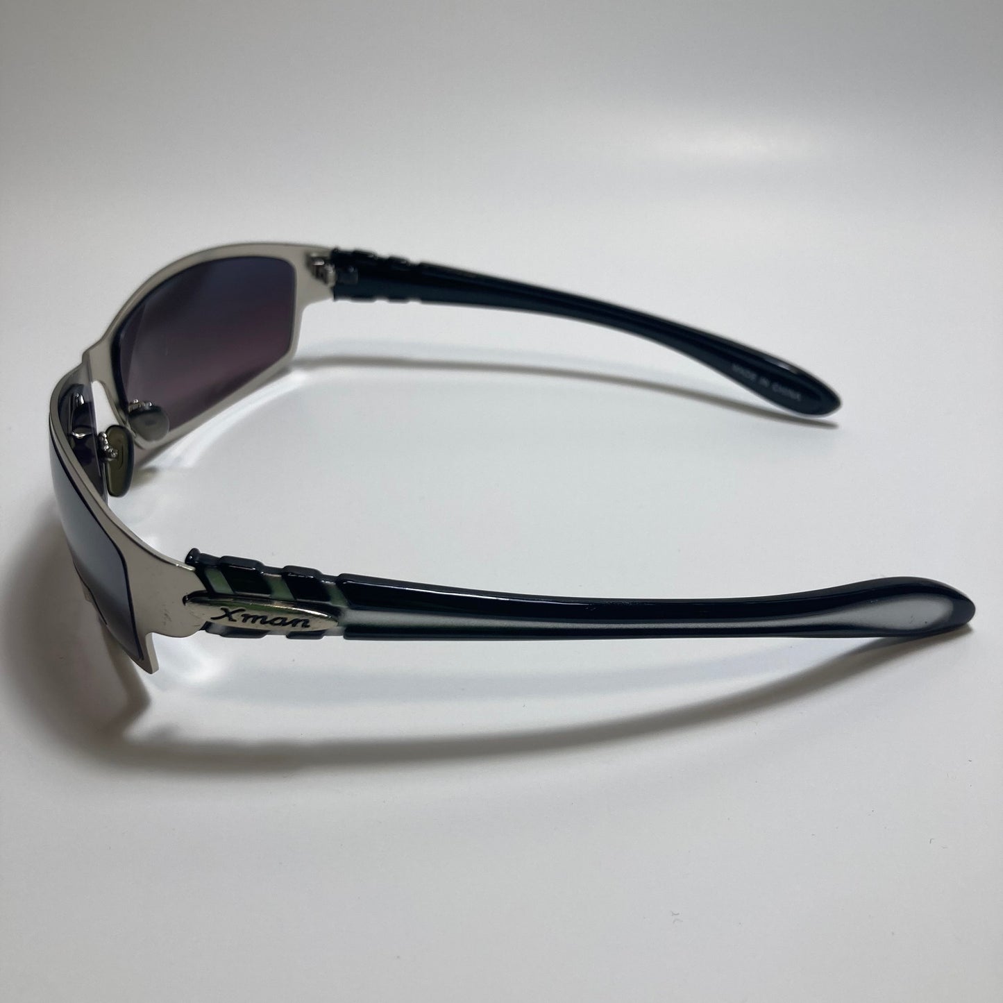 mens and womens black and silver metal wrap around sunglasses