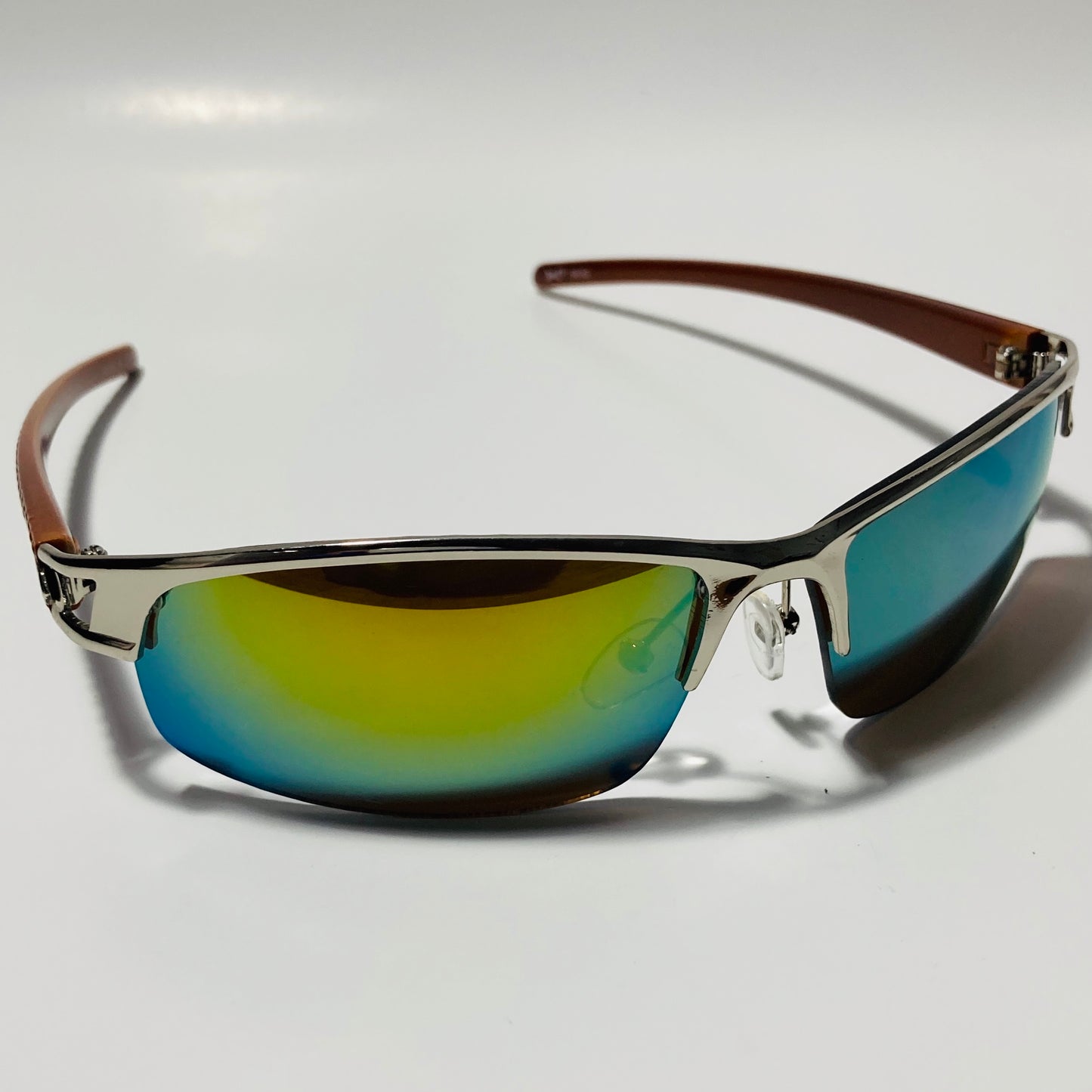 womens and mens silver wrap around sunglasses with mirrored green lenses
