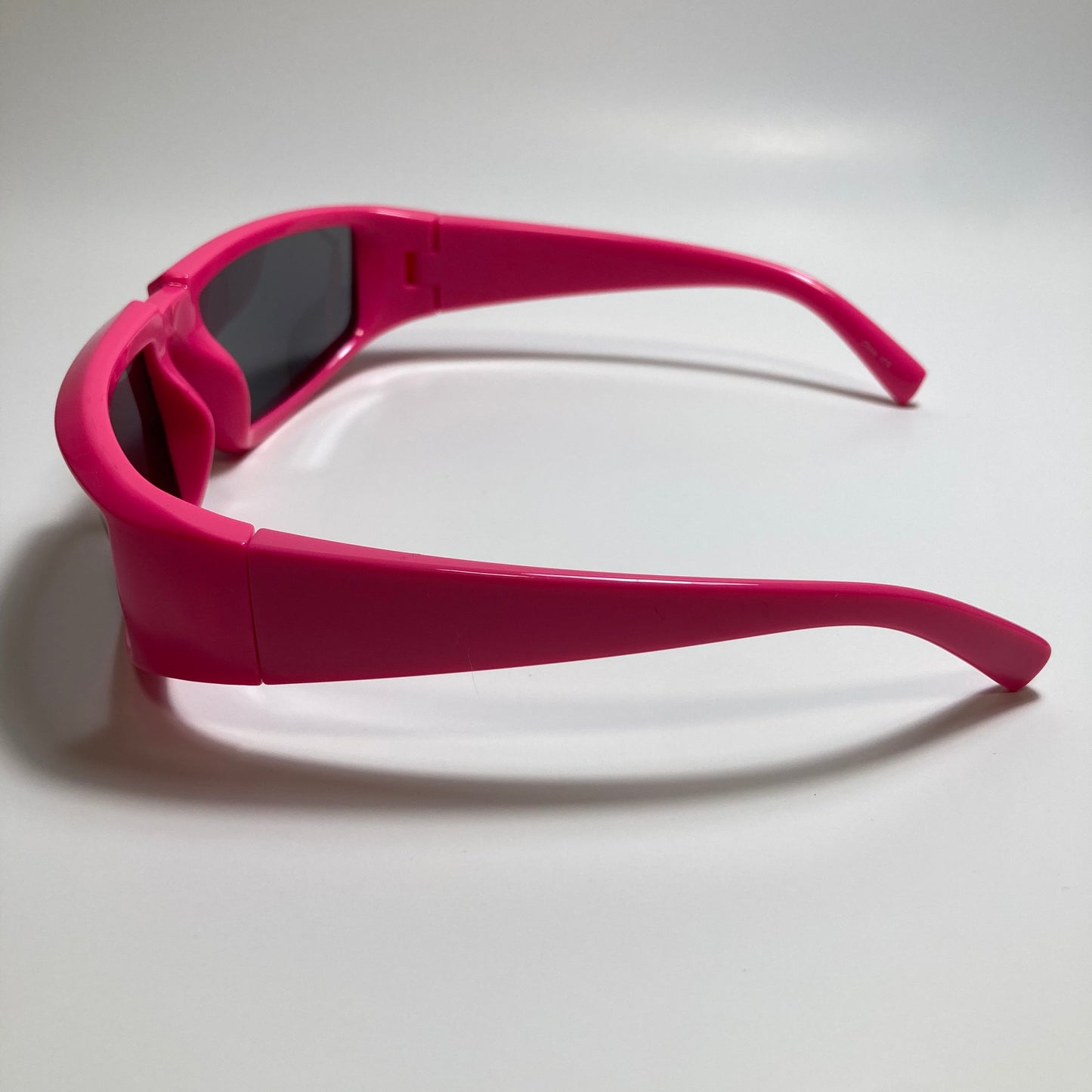 mens and womens pink and black wrap around sunglasses