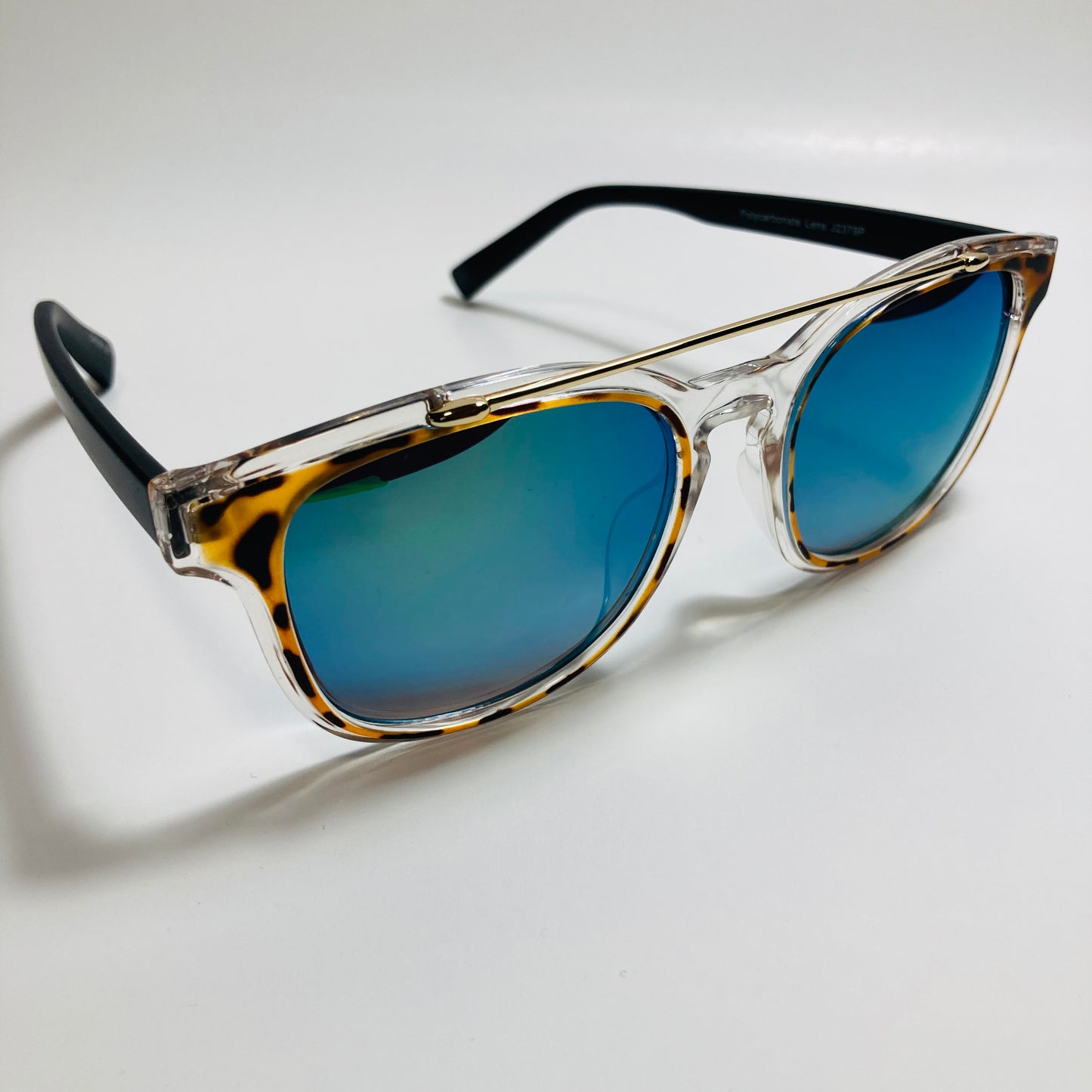 mens and womens clear black and blue mirrored round sunglasses with crossbar