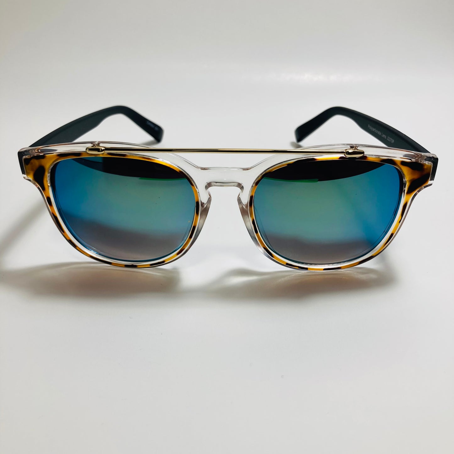 mens and womens clear black and blue mirrored round sunglasses with crossbar