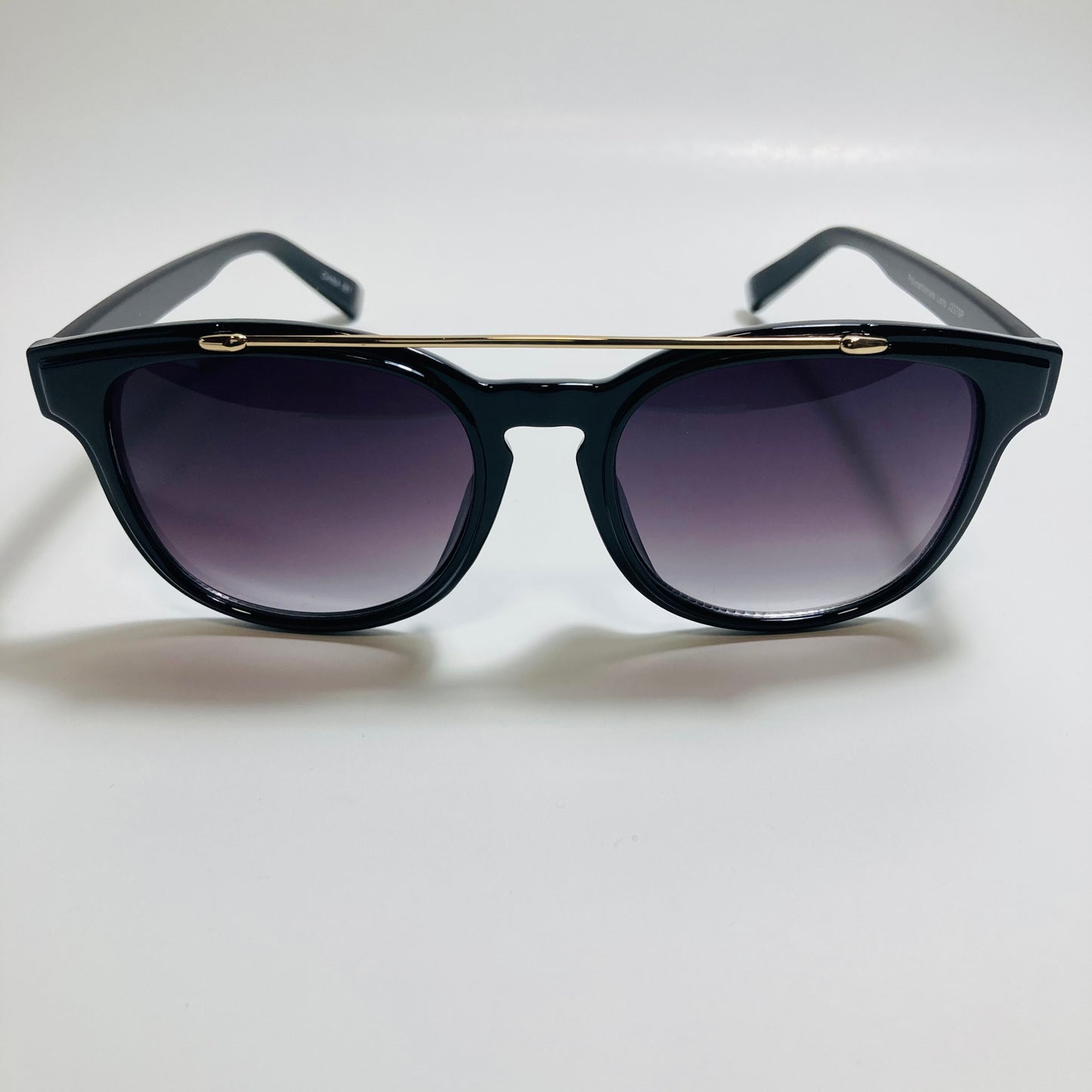 mens and womens black round sunglasses with crossbar