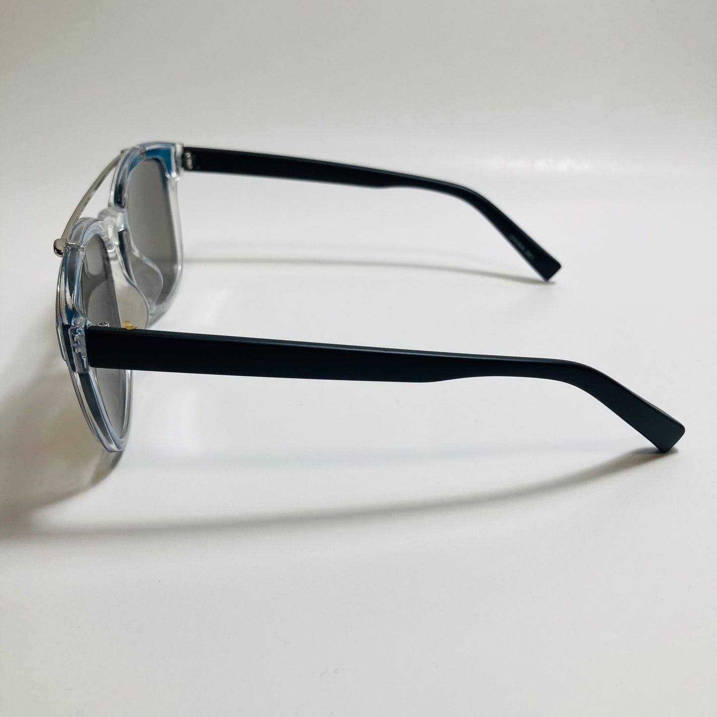 mens and womens blue and black mirrored round sunglasses with crossbar