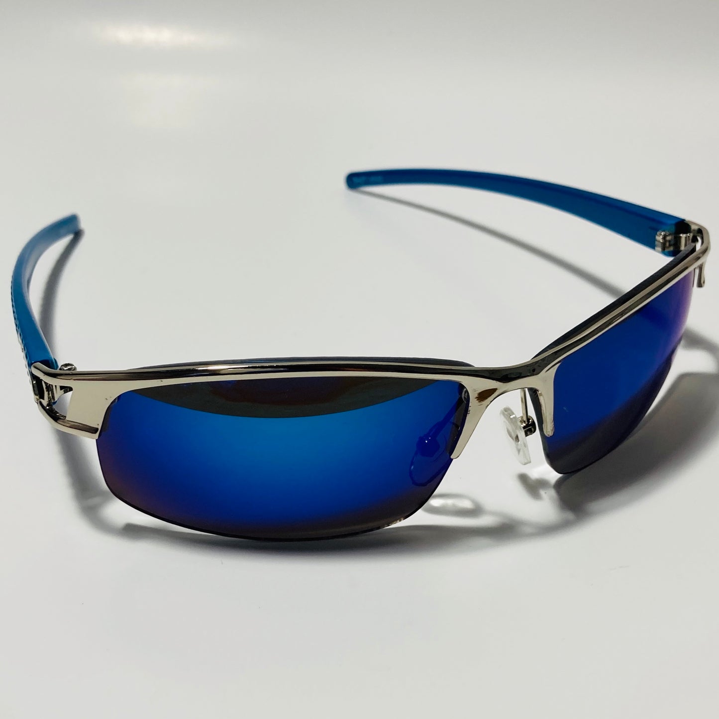 womens and mens silver wrap around sunglasses with mirrored blue lenses