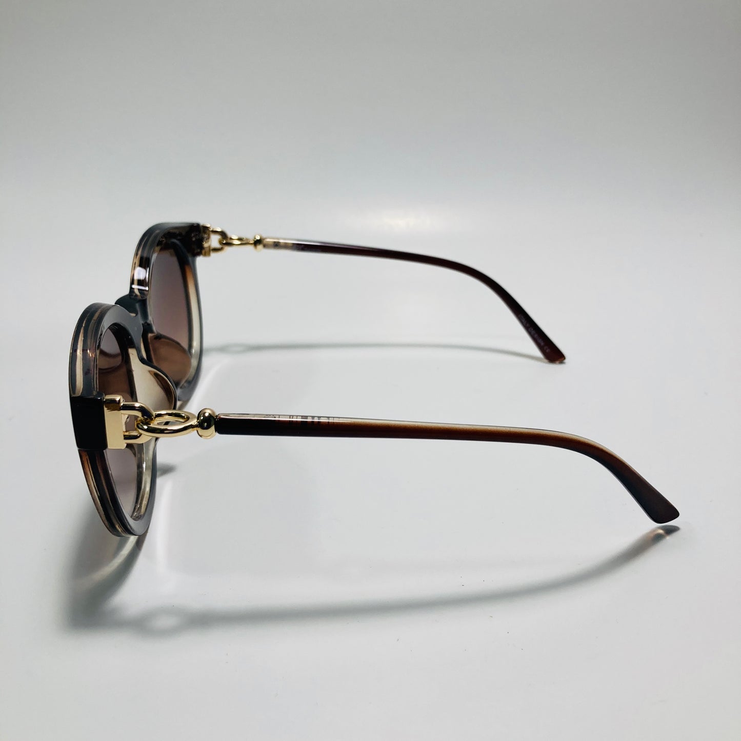 womens brown round sunglasses with brown lenses