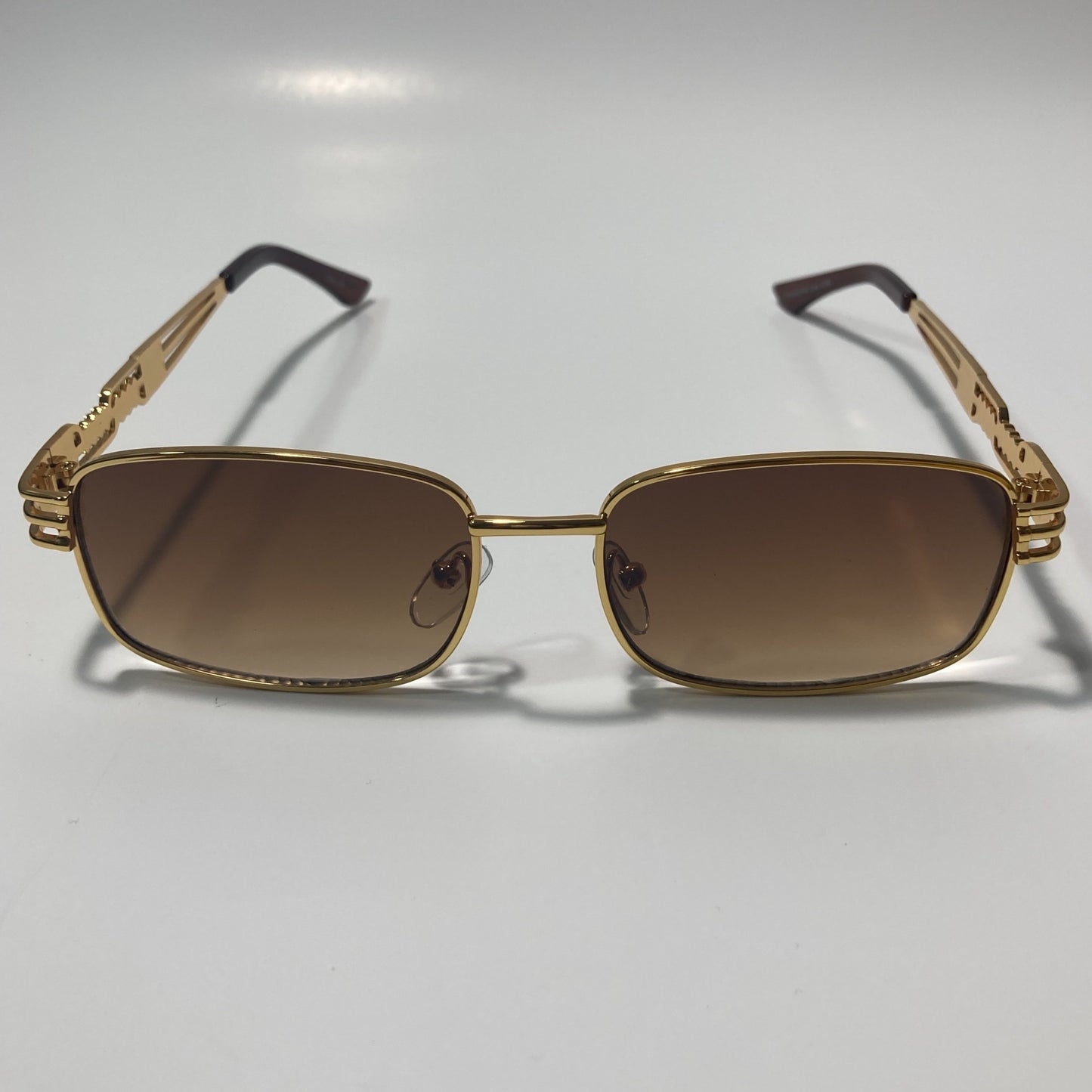 mens and womens gold square sunglasses with brown lenses