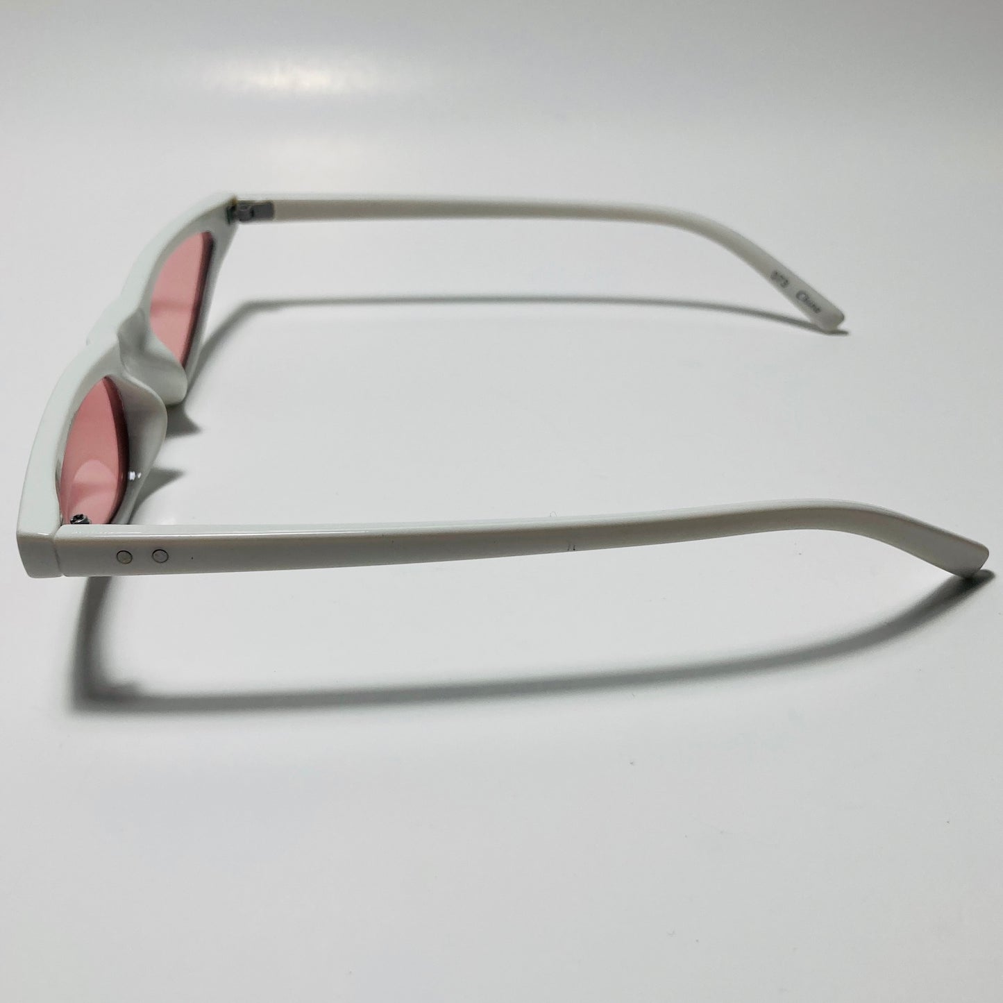 womens white and pink skinny cat eye sunglasses