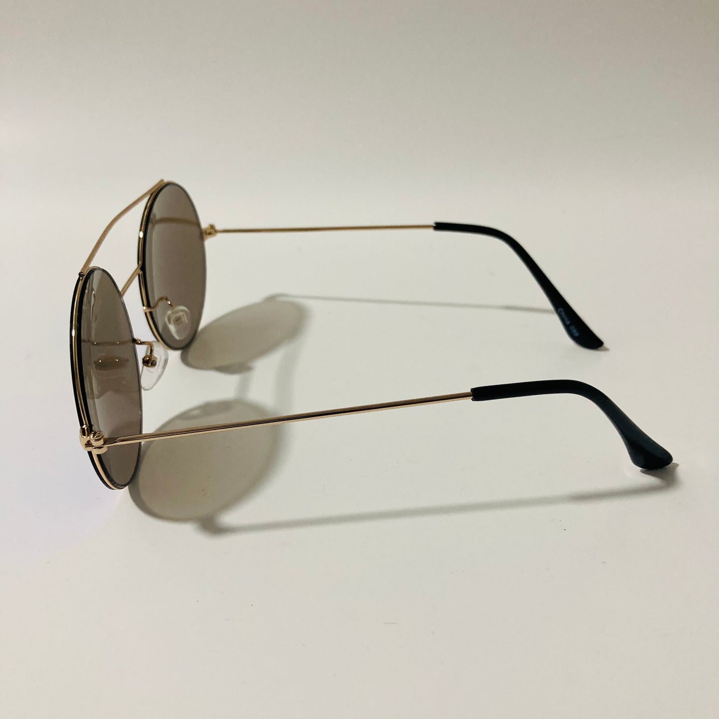 gold and blue mens and womens round sunglasses with mirror lenses