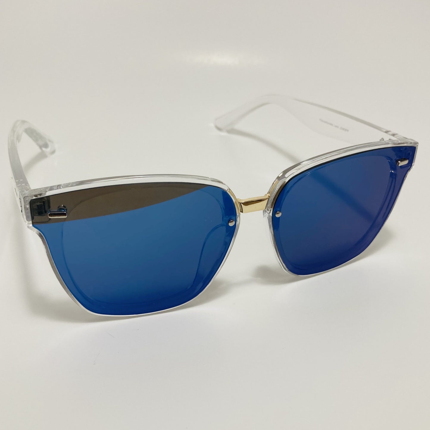 square womens sunglasses with clear frame and blue mirrored lenses