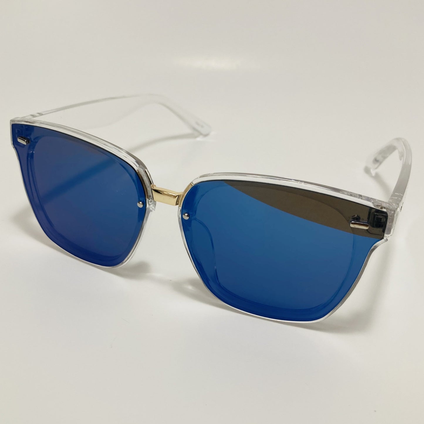 square womens sunglasses with clear frame and blue mirrored lenses
