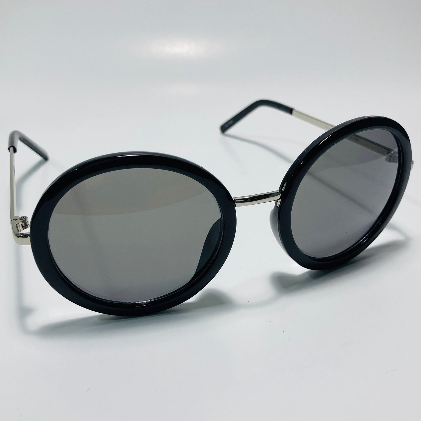 womens black and gray round sunglasses