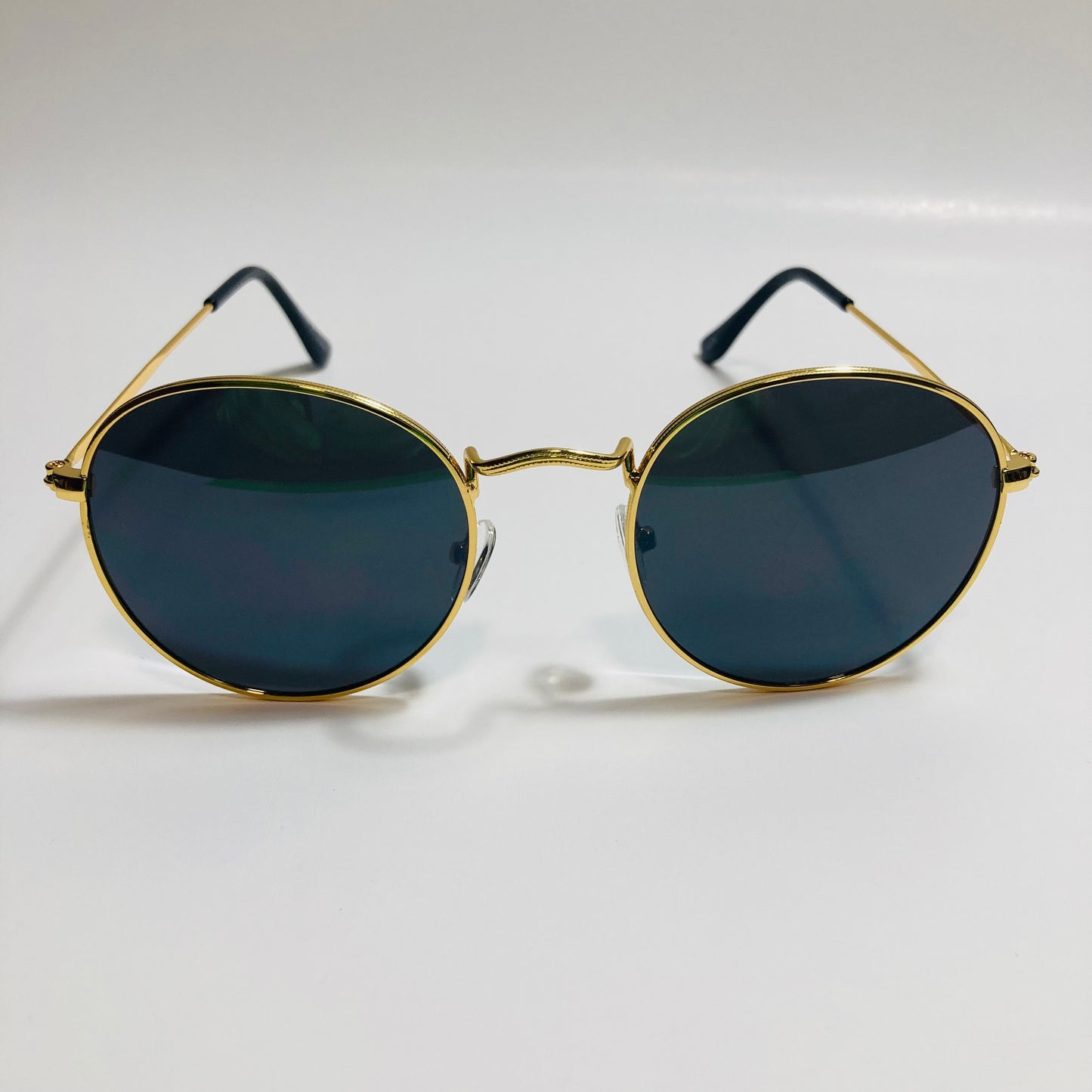 mens and womens round gold sunglasses with black lenses