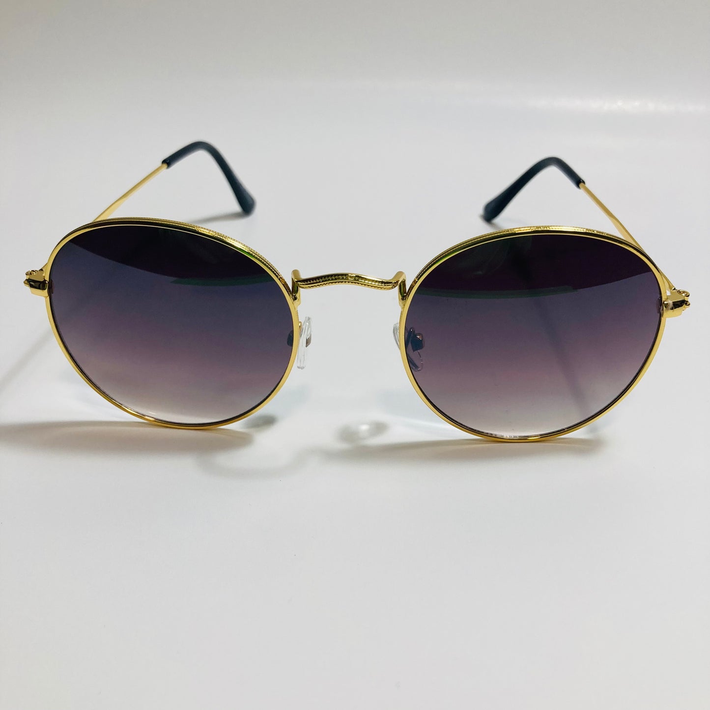 mens and womens round gold sunglasses with black lenses