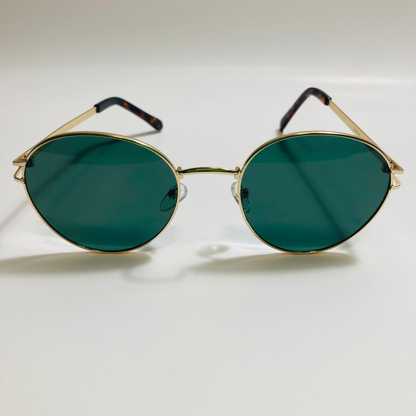 mens and womens gold and green metal round sunglasses